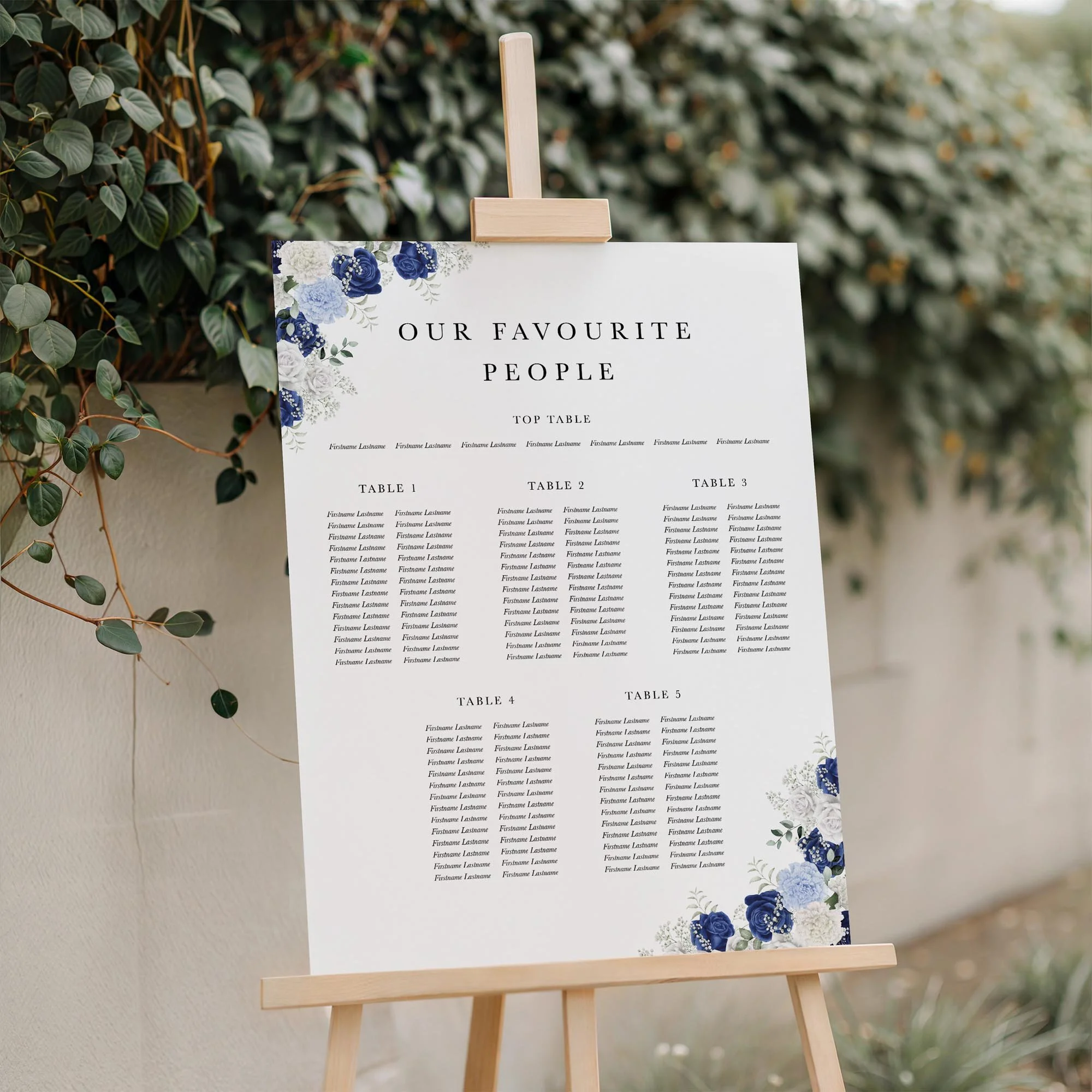 Close-up of the Royal Blue and White Rose wedding seating plan board displayed outdoors