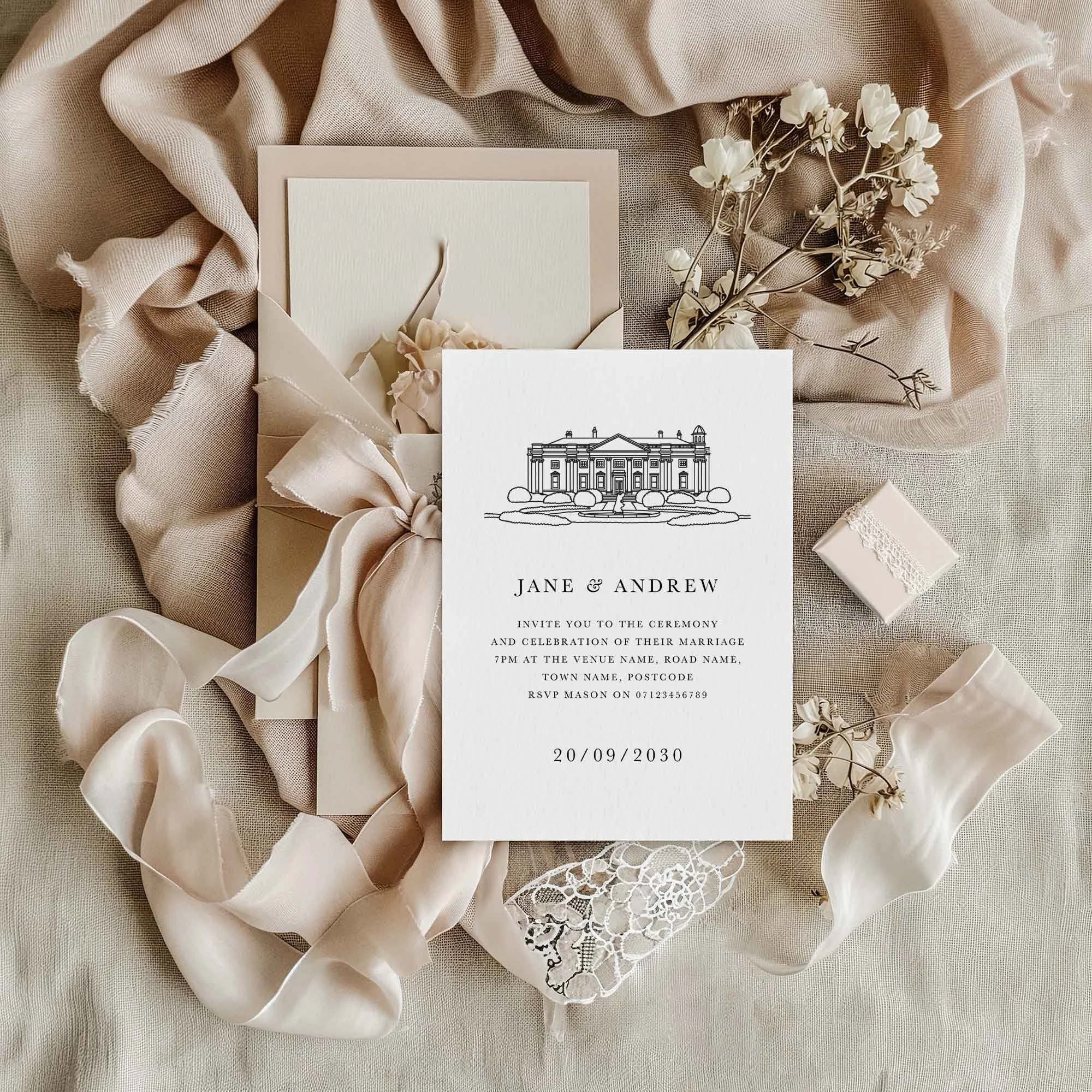 Bespoke Venue Drawing wedding invitation styled in a flat lay environment with wedding props