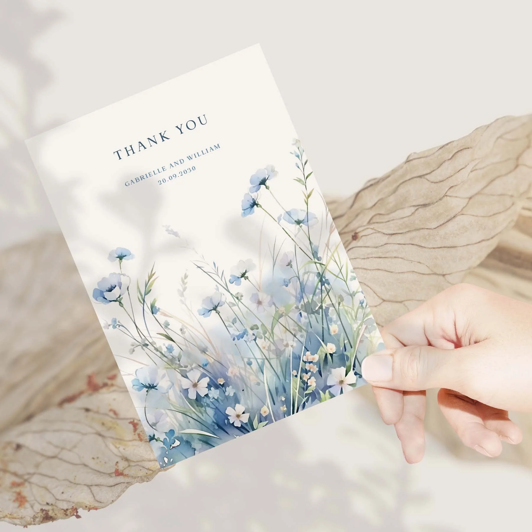 Hand holding a Blue Wildflowers wedding thank you card