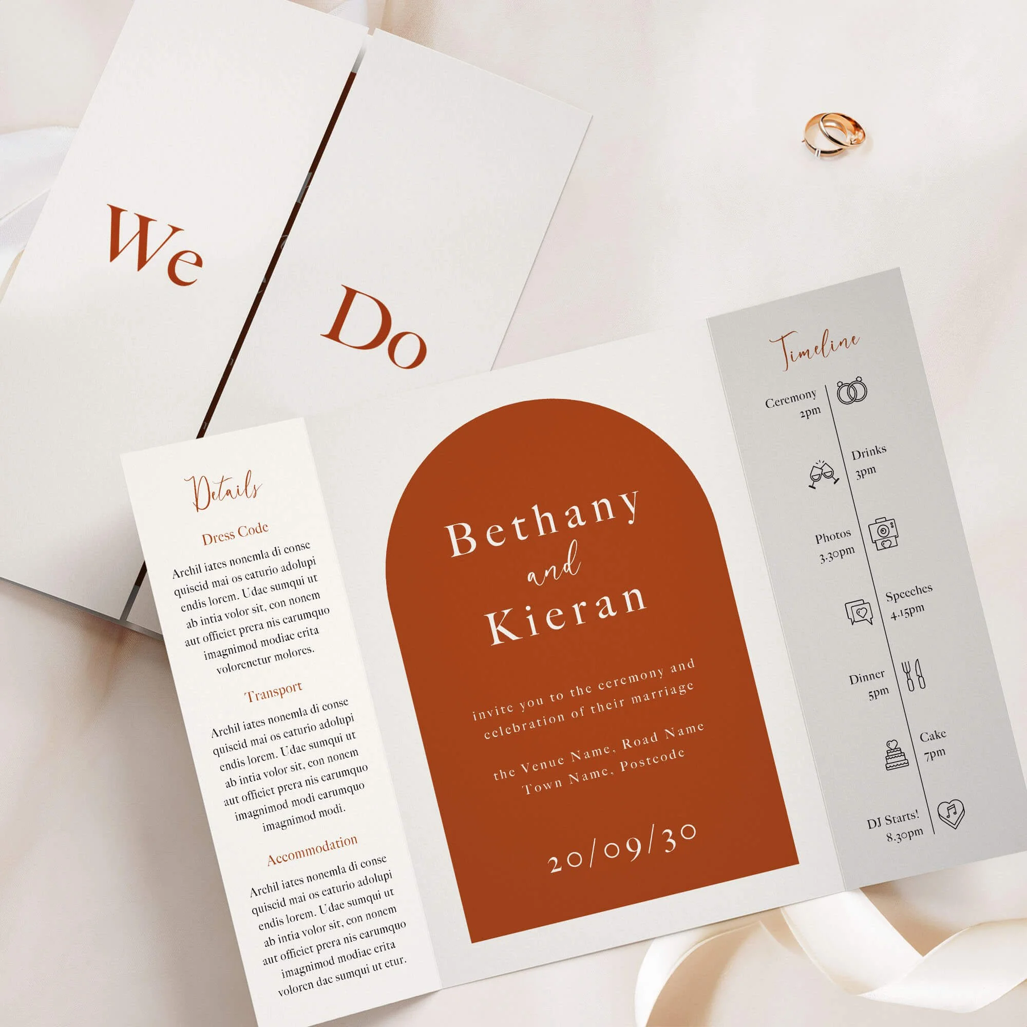 Terracotta arch gatefold wedding invitation in rust and burnt orange with modern bold typography