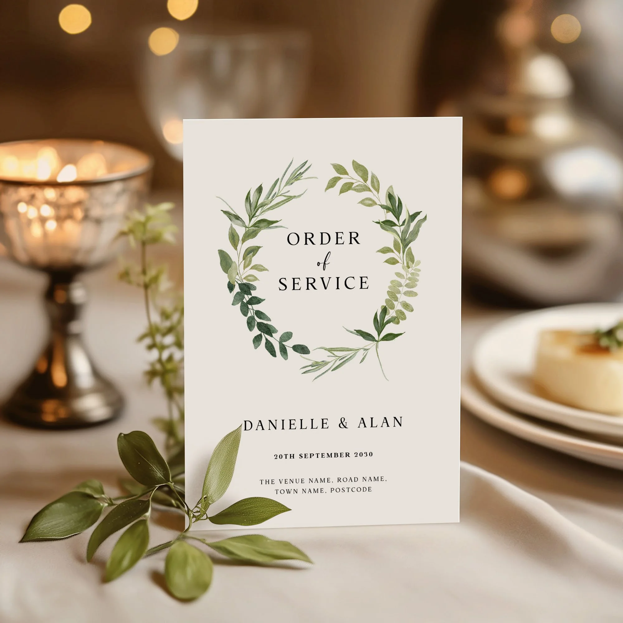 Greenery wedding order of service on a wedding day displayed