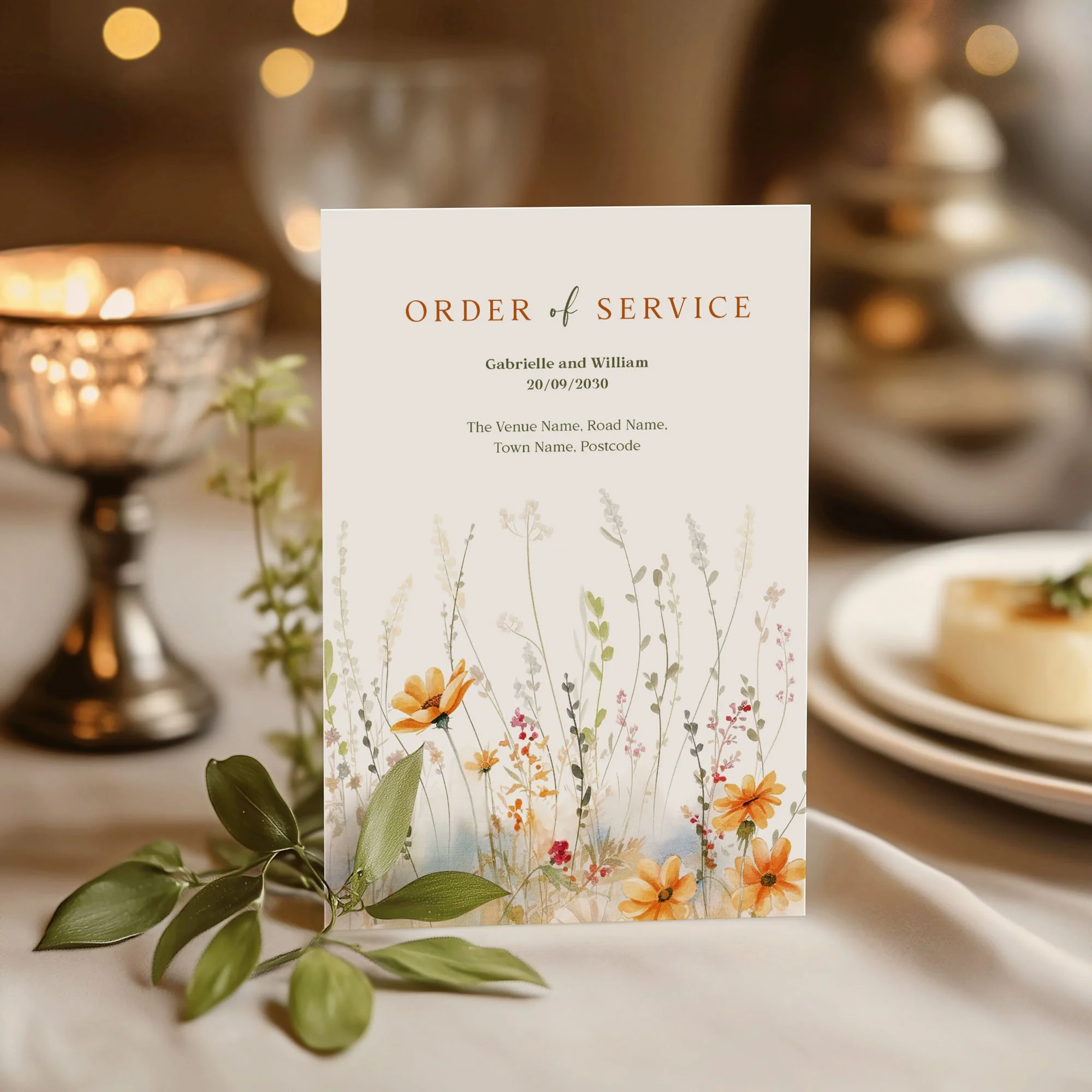 Wedding order of service booklet featuring terracotta wildflower design