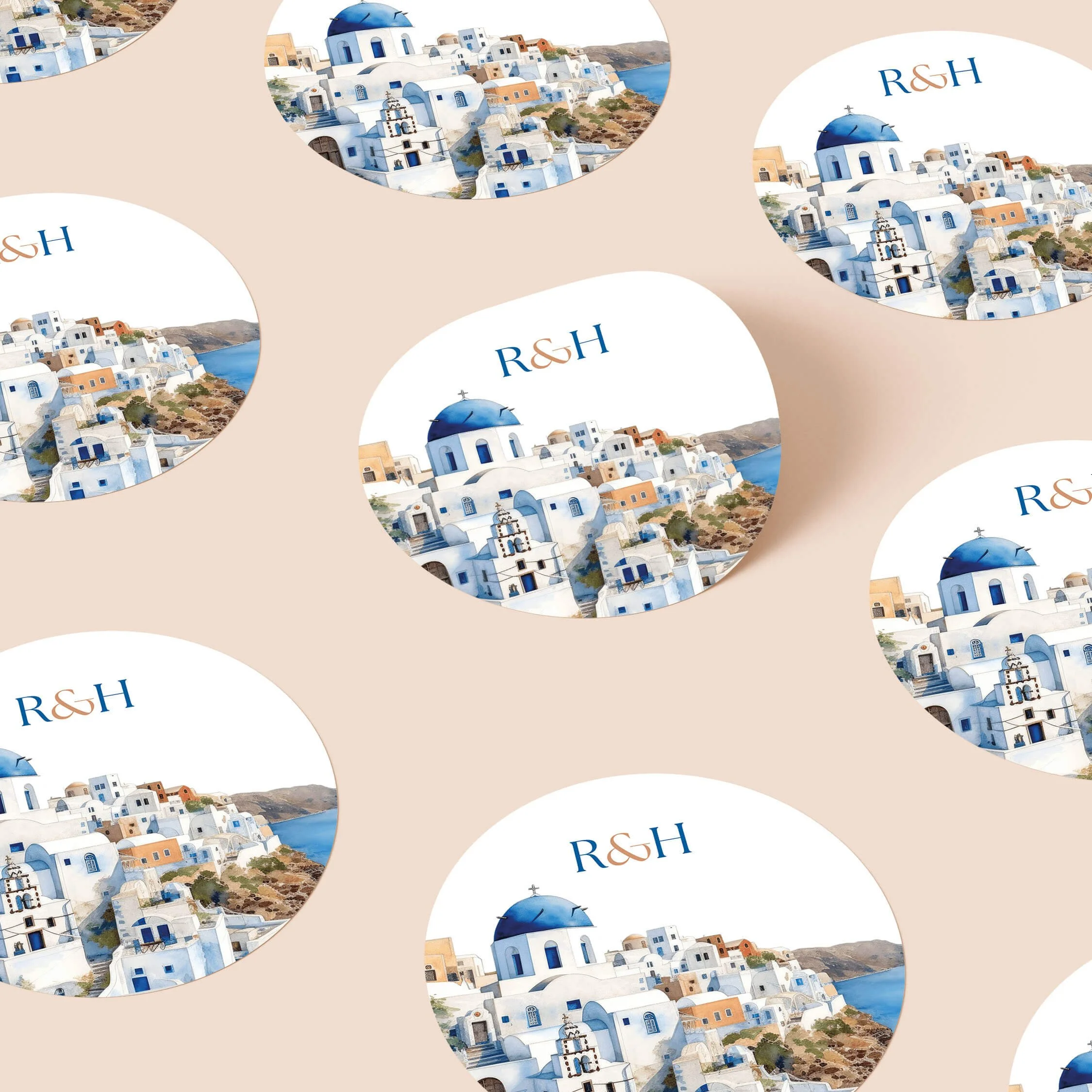 Santorini personalised wedding stickers with blue coastal destination wedding design and initials on round stickers