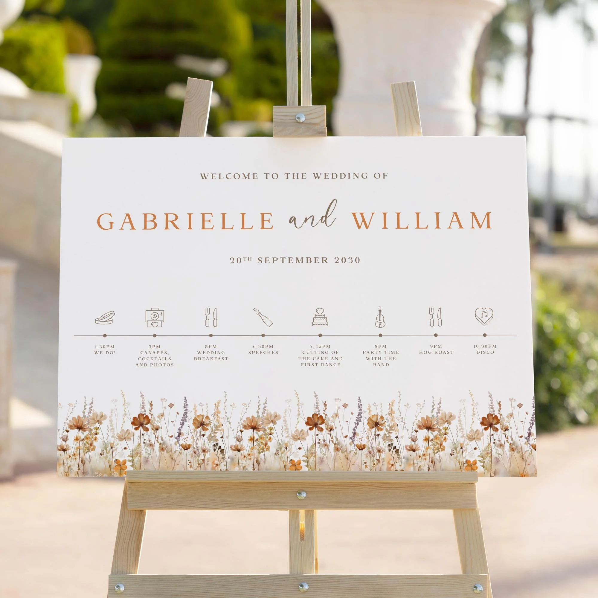 Earth Tone Wildflower wedding welcome sign styled outdoors close-up
