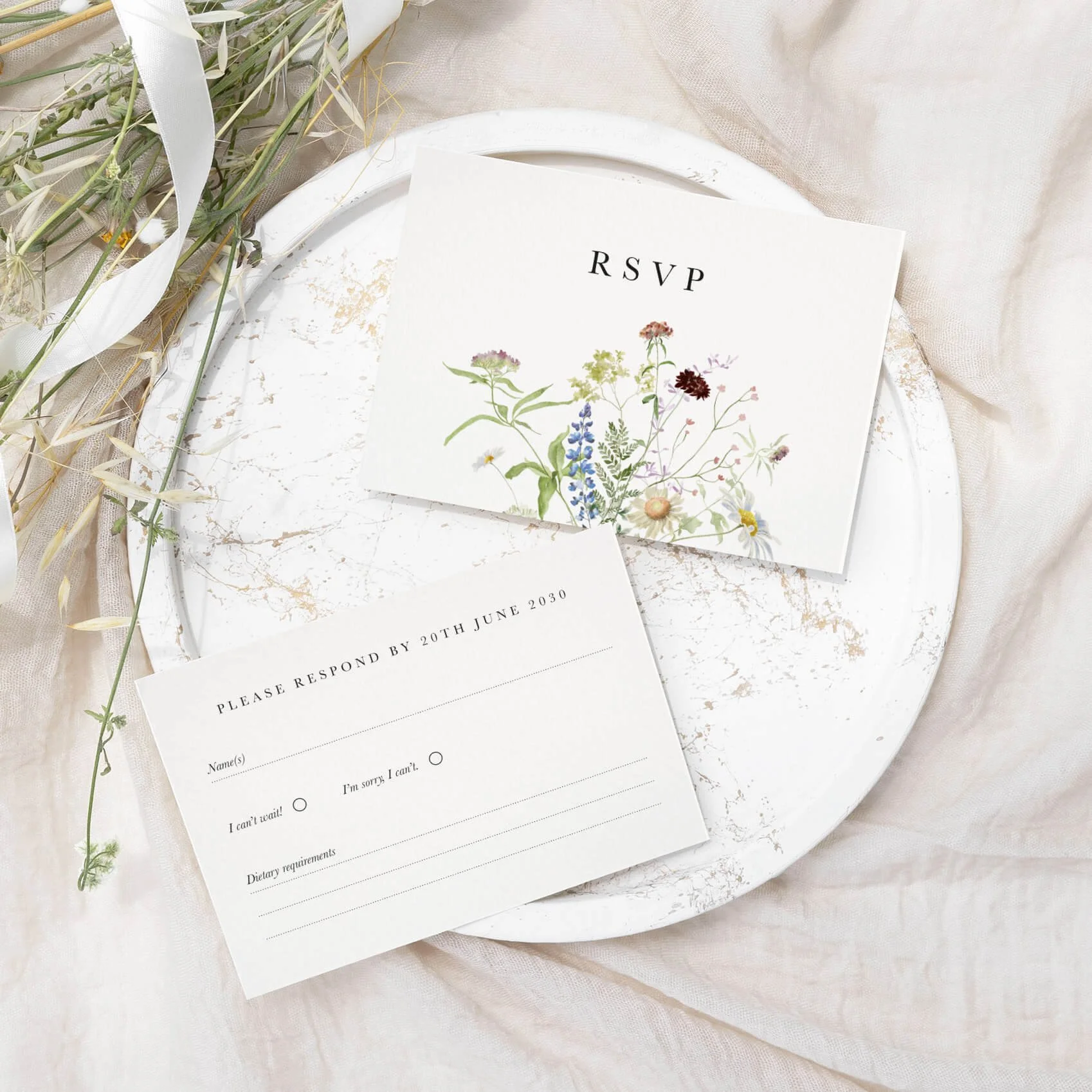 Meadow wedding RSVP card with watercolour wildflower meadow botanical illustration on luxury off-white card