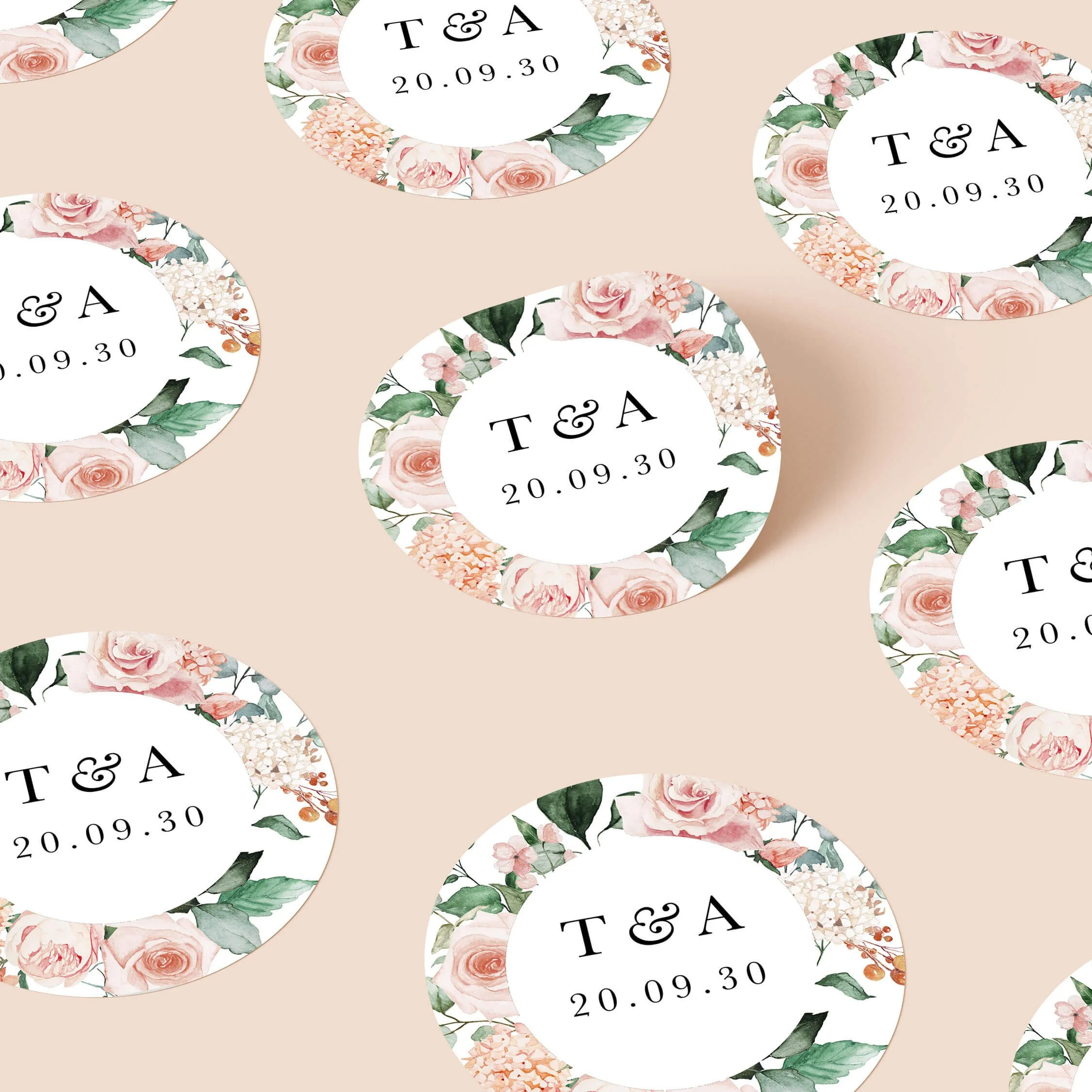 Blush bouquet wedding stickers with pink rose floral border and initials repeated on personalised round seals
