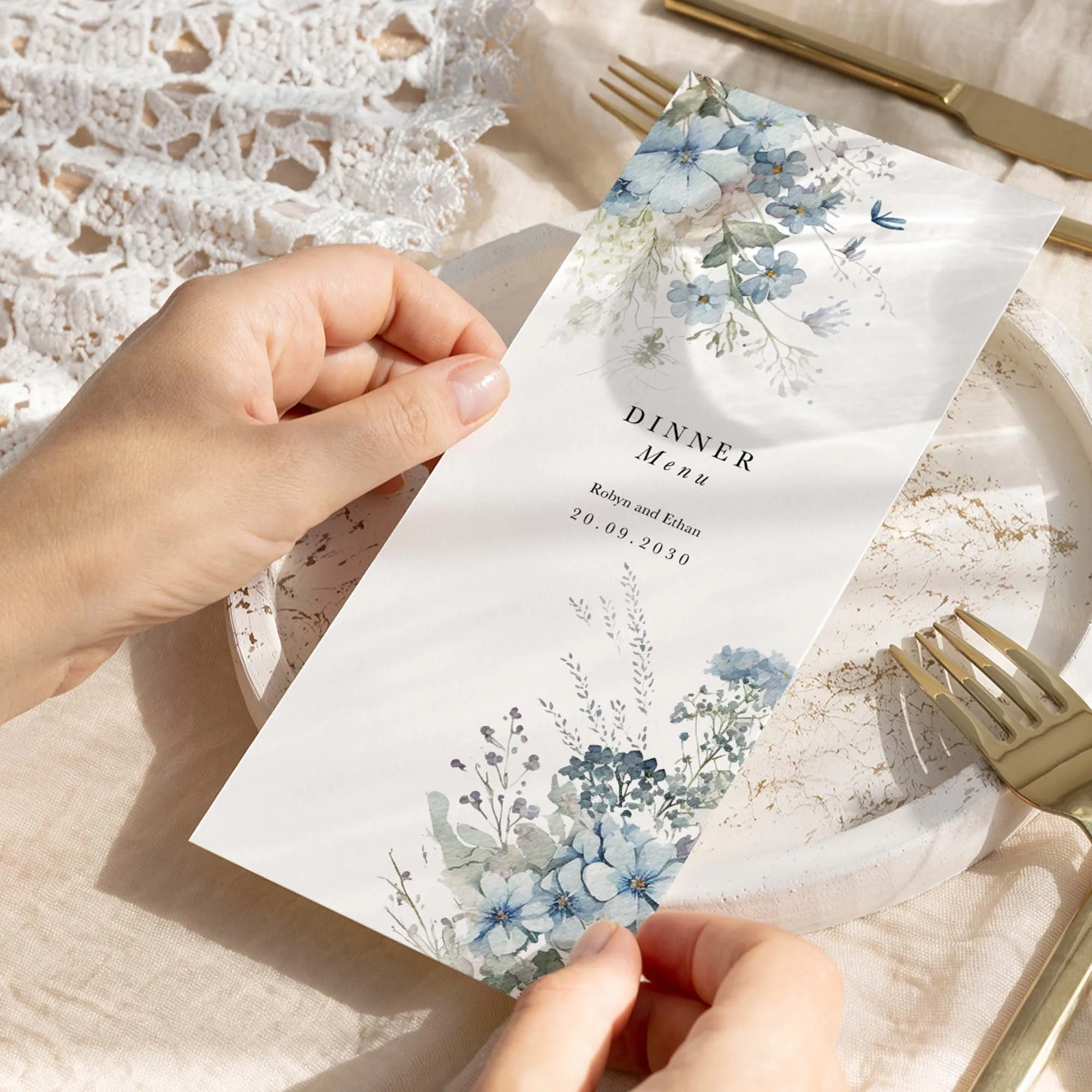 Hand holding Dusty Blue Floral wedding menu card showing size and printed design details