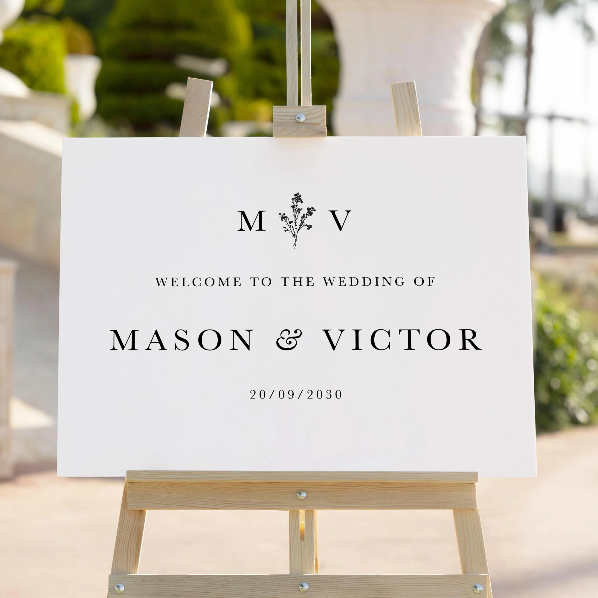 Monogram wedding welcome sign styled outdoors close-up