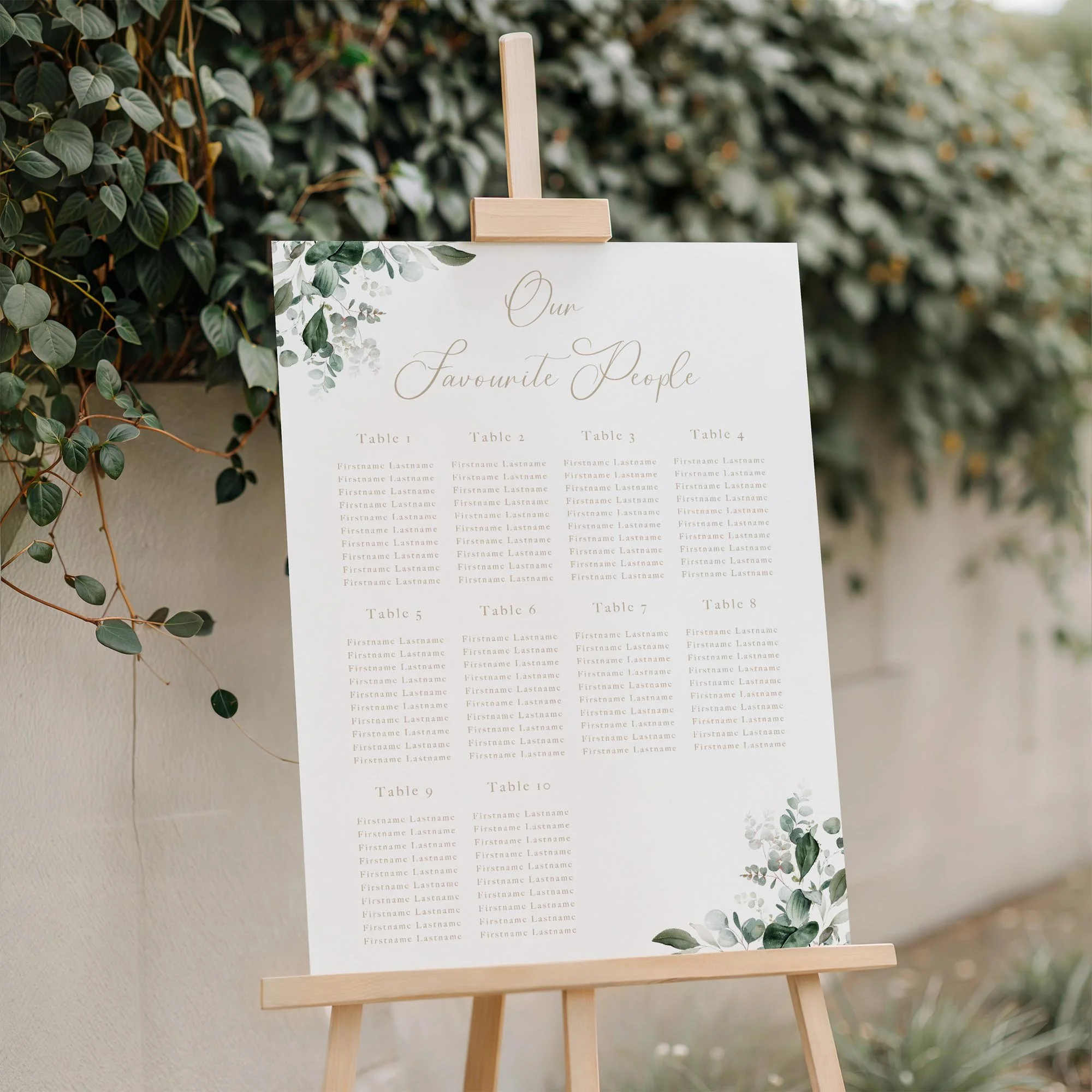 Close-up of the Emerald Leaves wedding seating plan board displayed outdoors