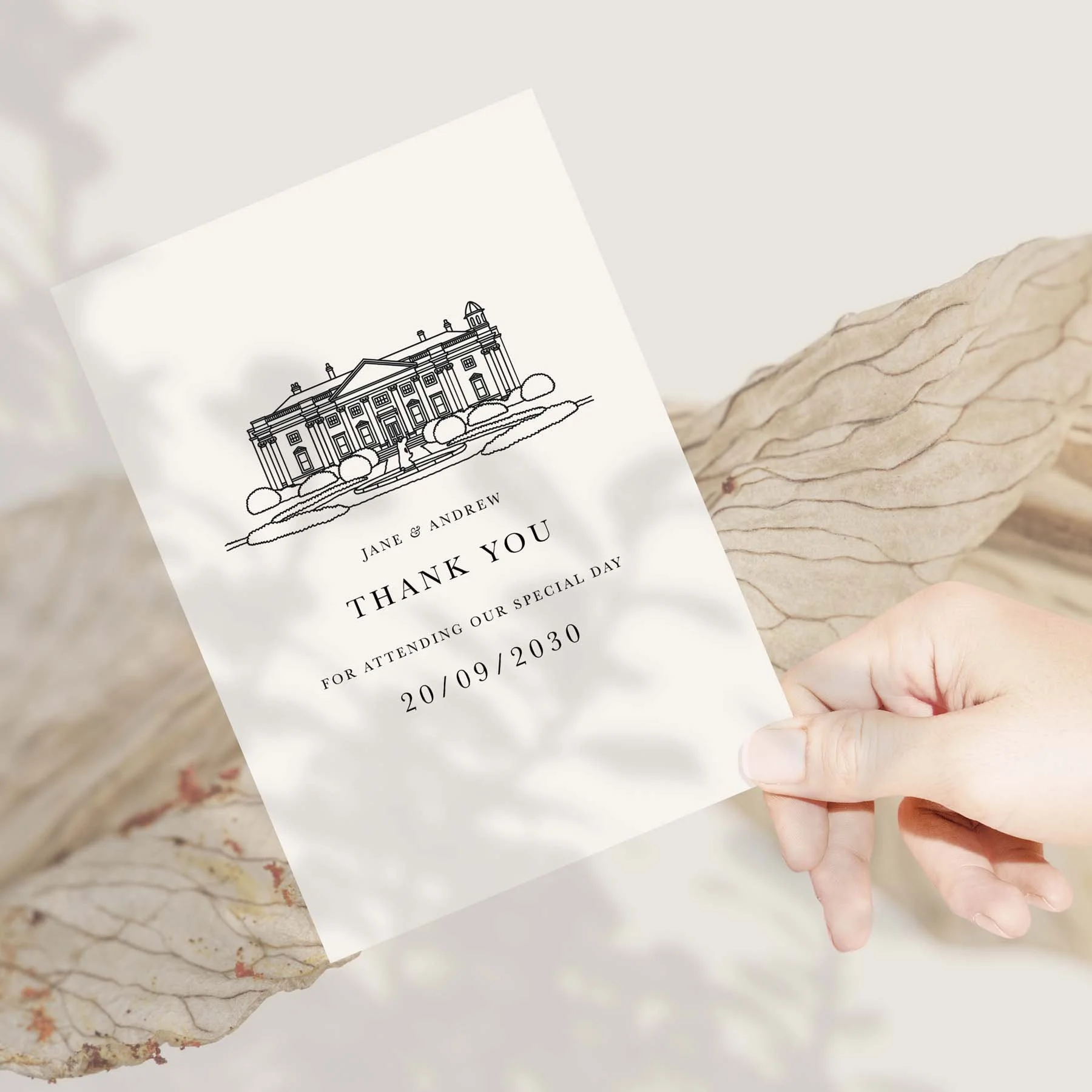 Hand holding a Bespoke Venue Drawing wedding thank you card