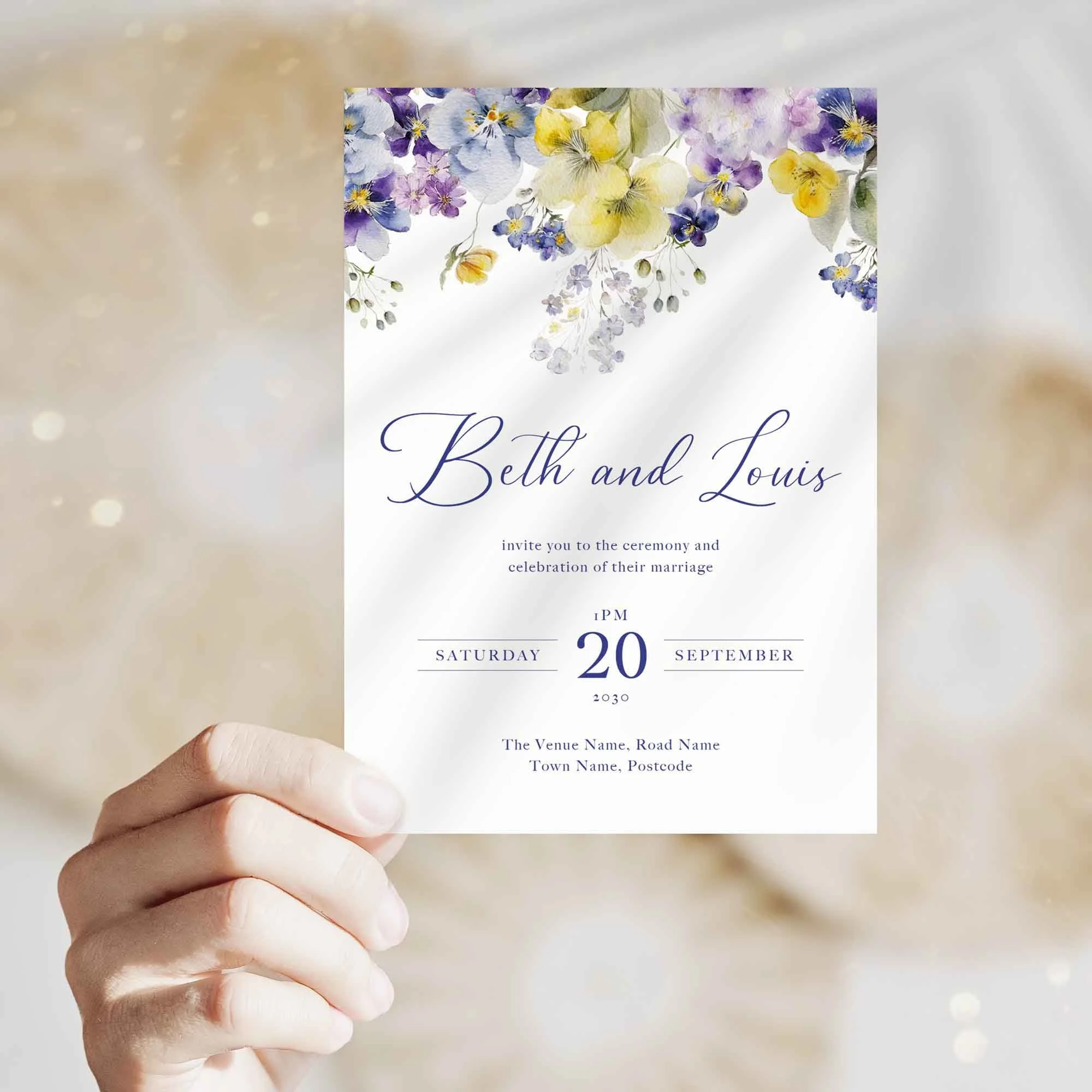 Hand holding Violet and Yellow wedding invitation showing size and printed design details