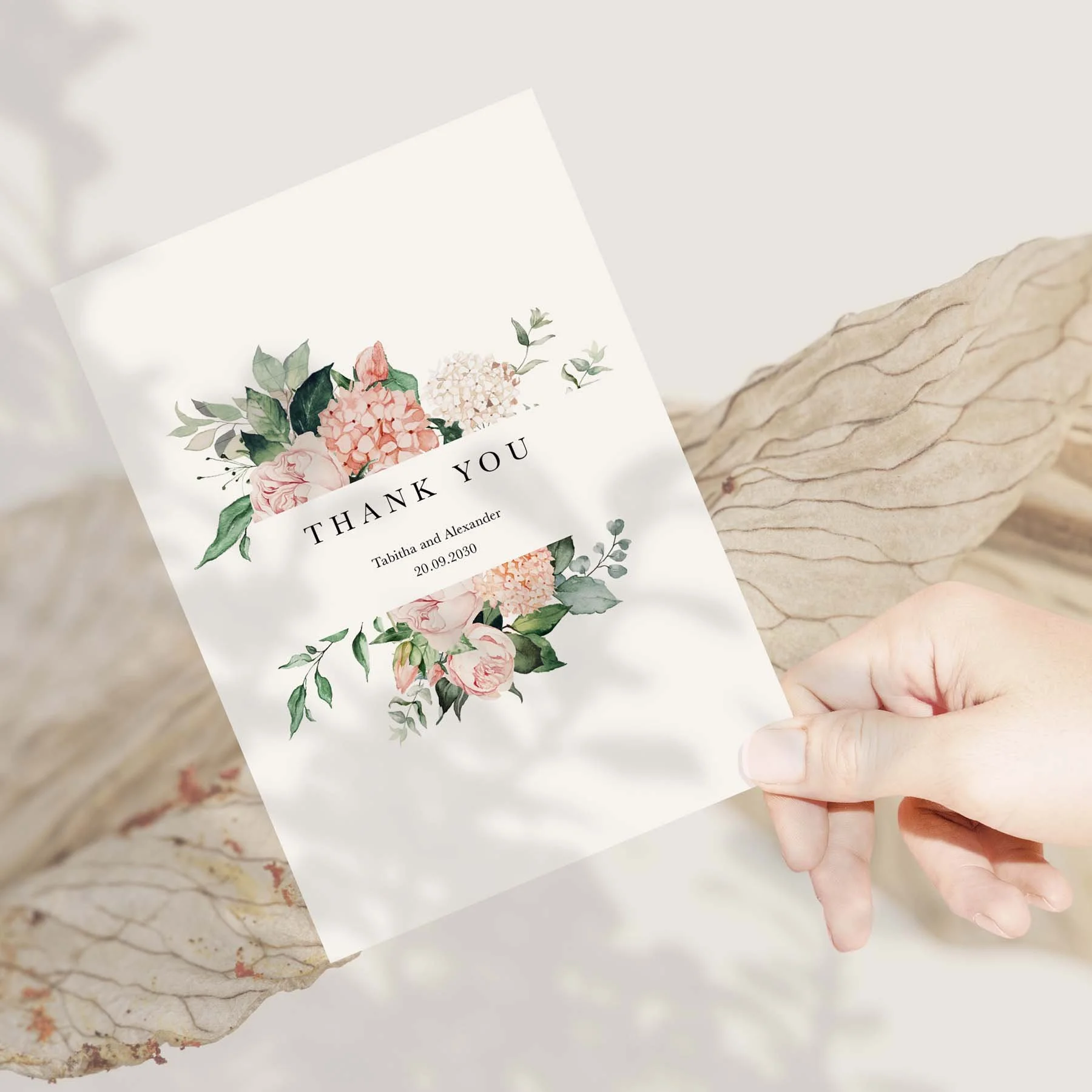 Hand holding a Blush Pink Flowers wedding thank you card