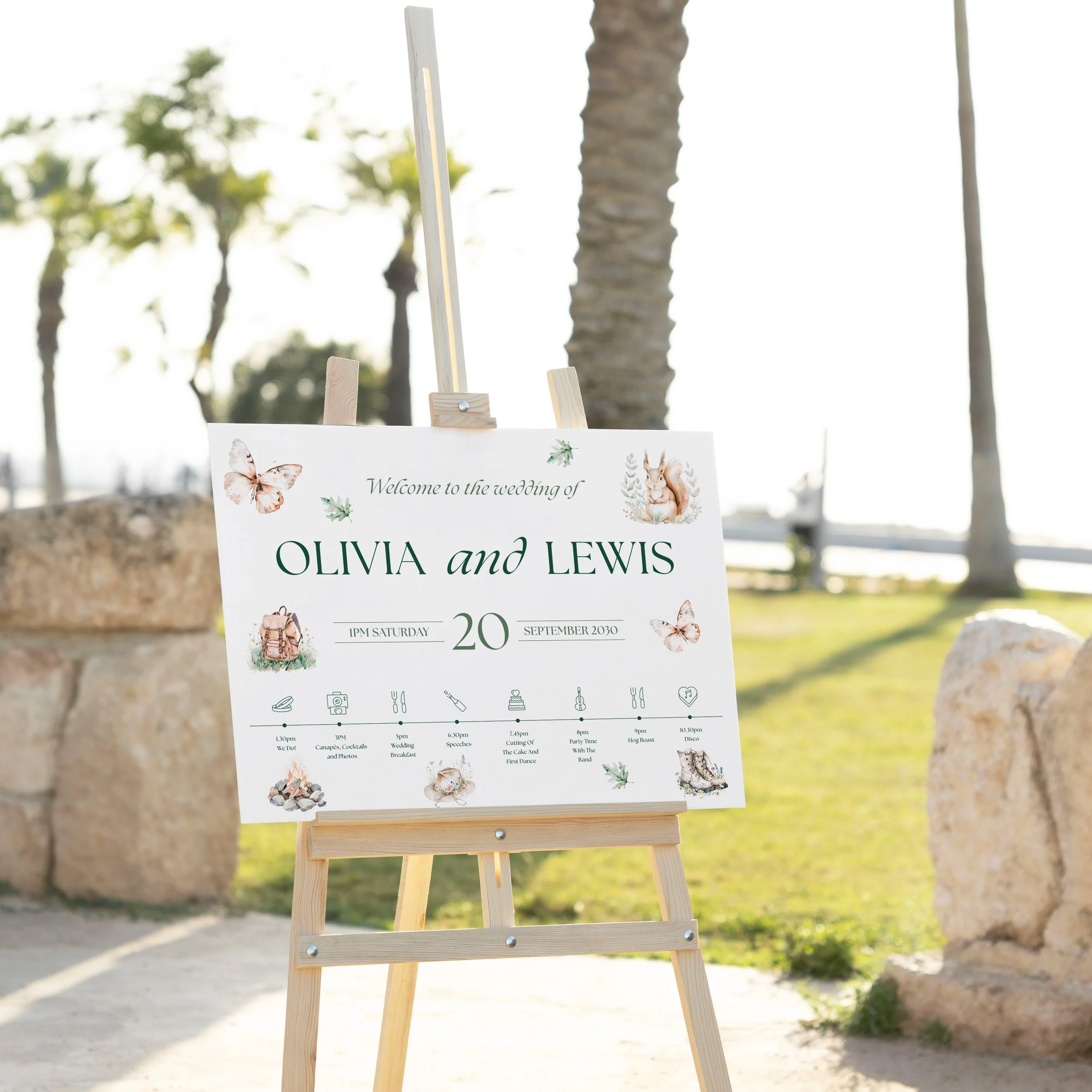 Adventure Wedding Welcome Sign on easel outside a wedding venue with watercolour nature details.