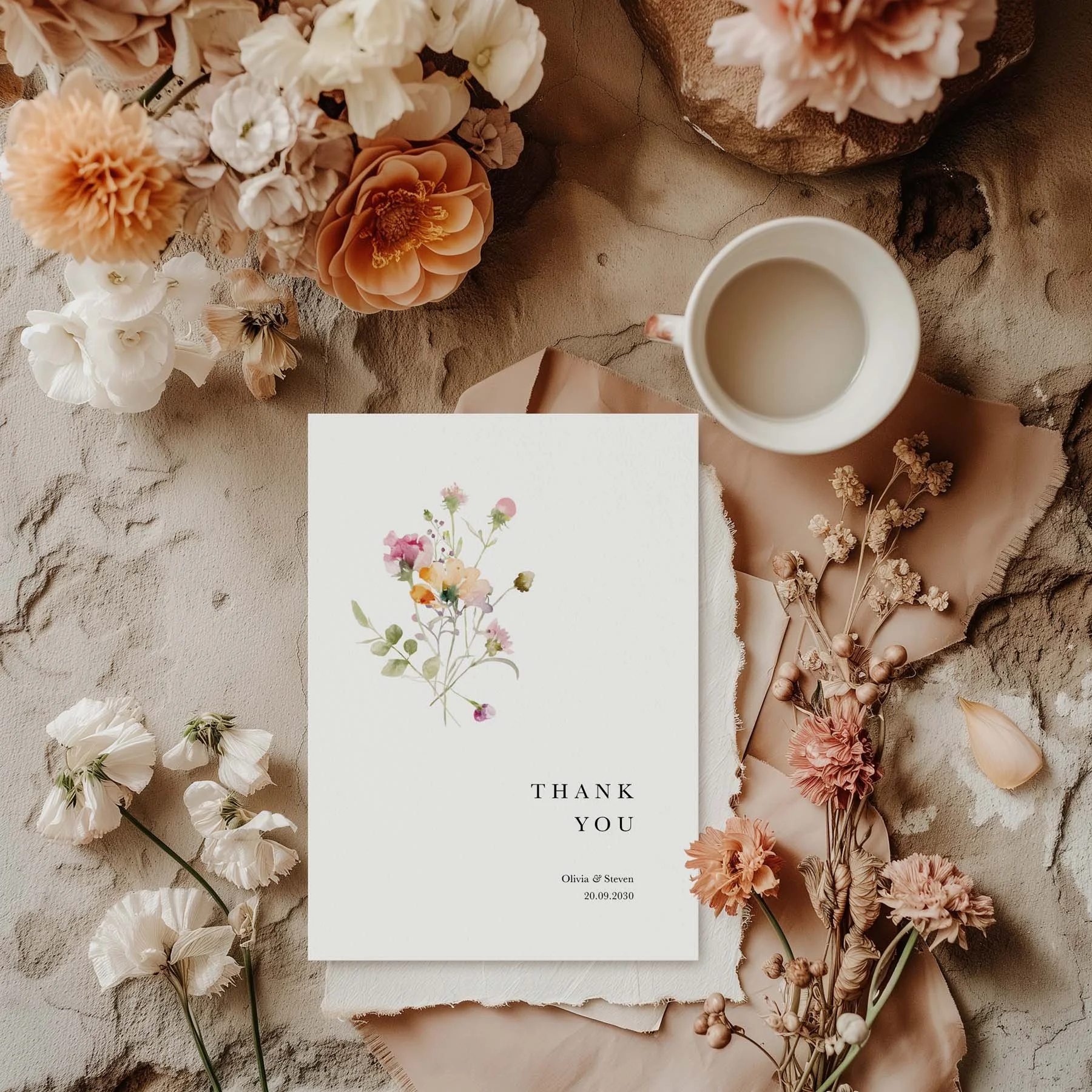 Pastel Floral wedding thank you card styled with flowers and stationery details