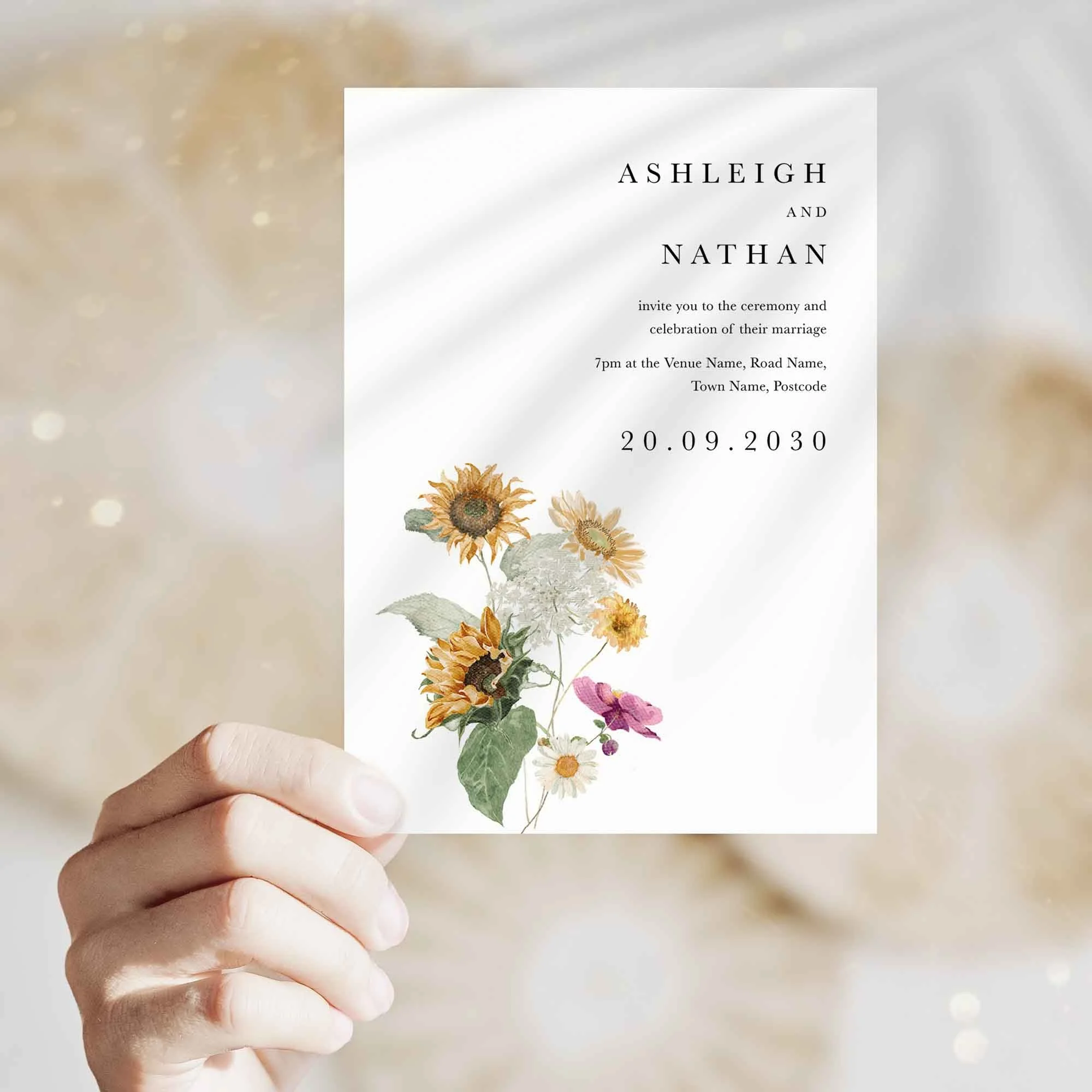 Hand holding Autumn Sunflower wedding invitation showing size and printed design details