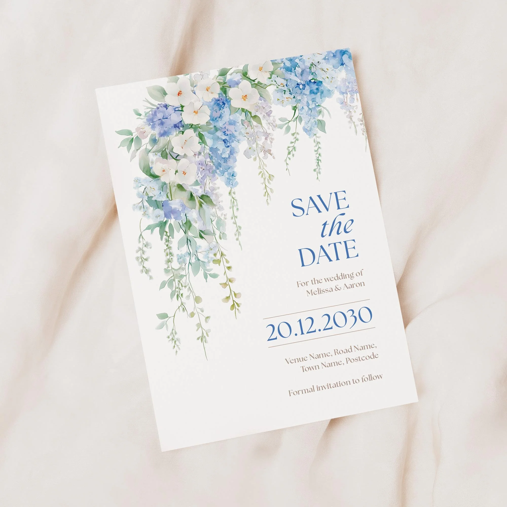 Minimal product shot of the Serenity Save the Date card with cascading blue florals.