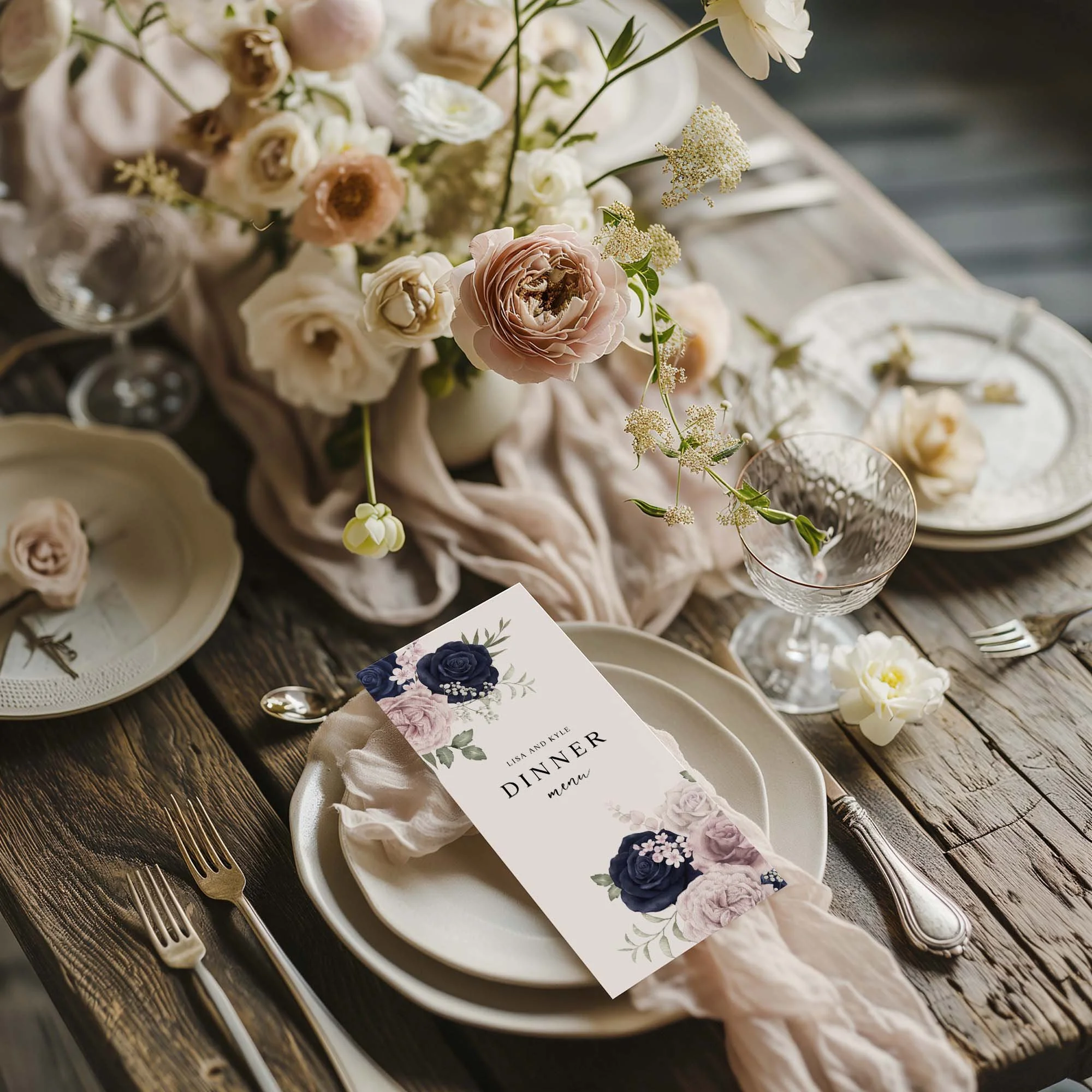 Navy and Blush Floral wedding menu card styled on a wedding table setting with tableware and décor
