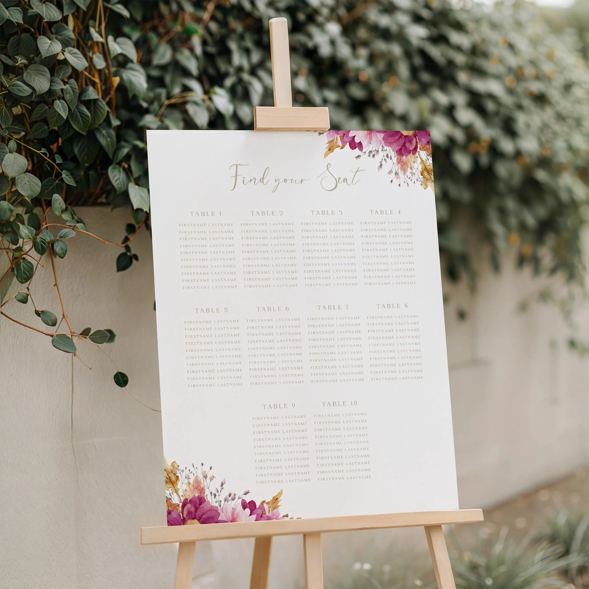 Close-up of the Dark Pink Chrysanthemum wedding seating plan board displayed outdoors