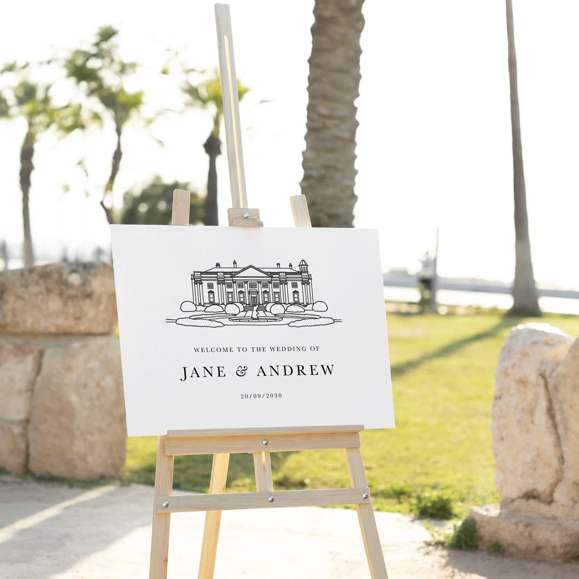 Bespoke Venue Sketch wedding welcome sign displayed outdoors at a wedding venue on an easel