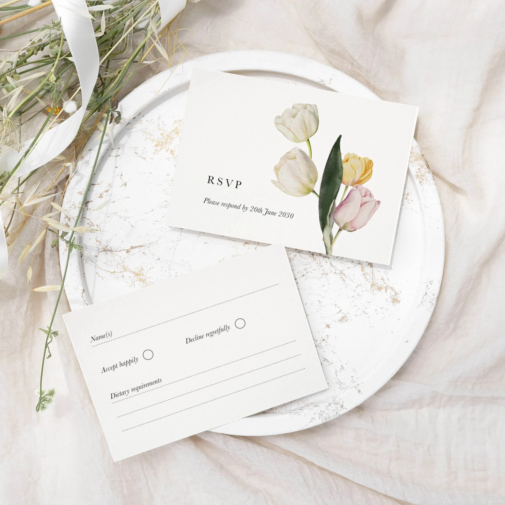 Tulip wedding RSVP card with soft pink watercolour tulip stem illustration on luxury off-white card