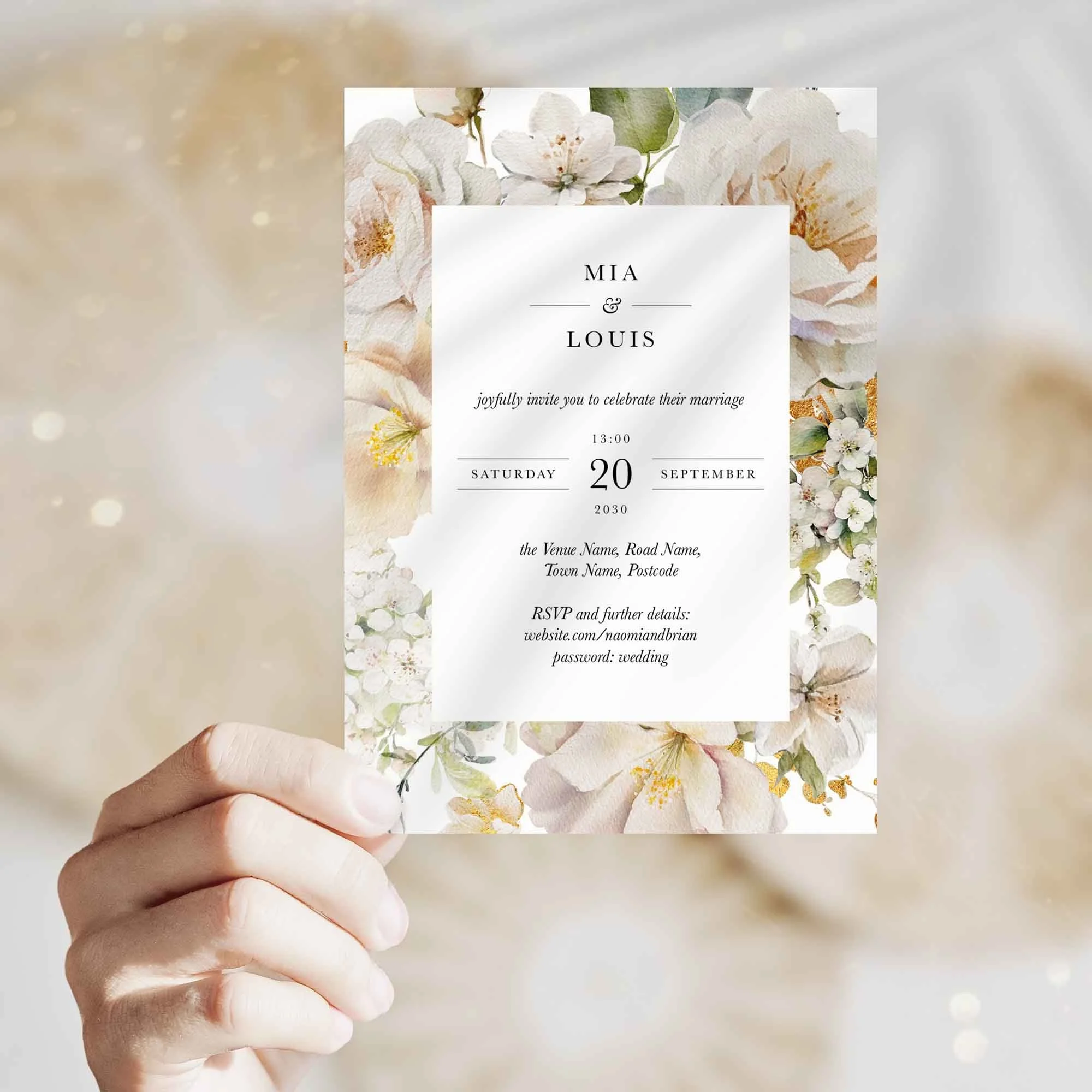Hand holding Ethereal wedding invitation showing size and printed design details