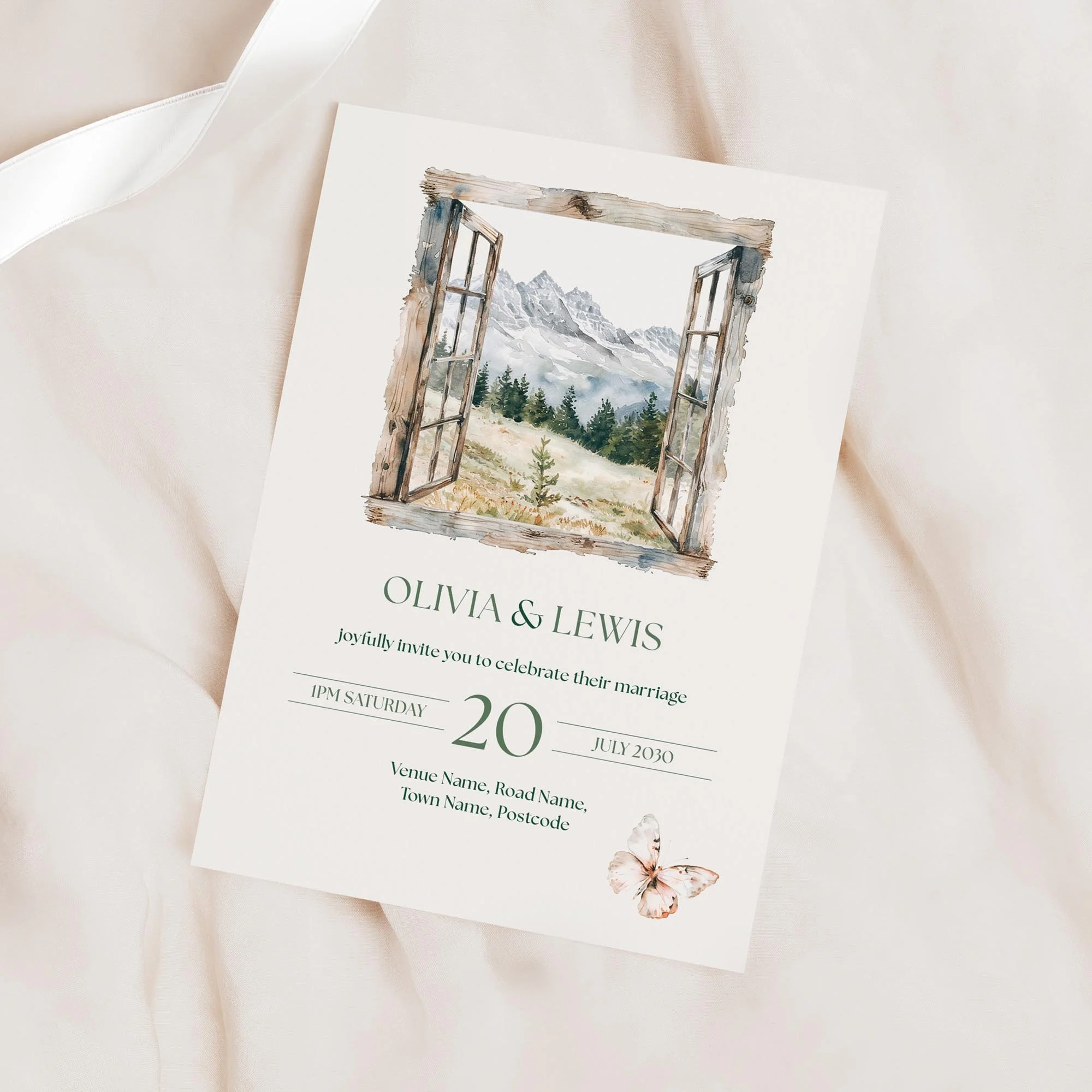 Minimal product shot of the Adventure Wedding Invitation with rustic window mountain design.
