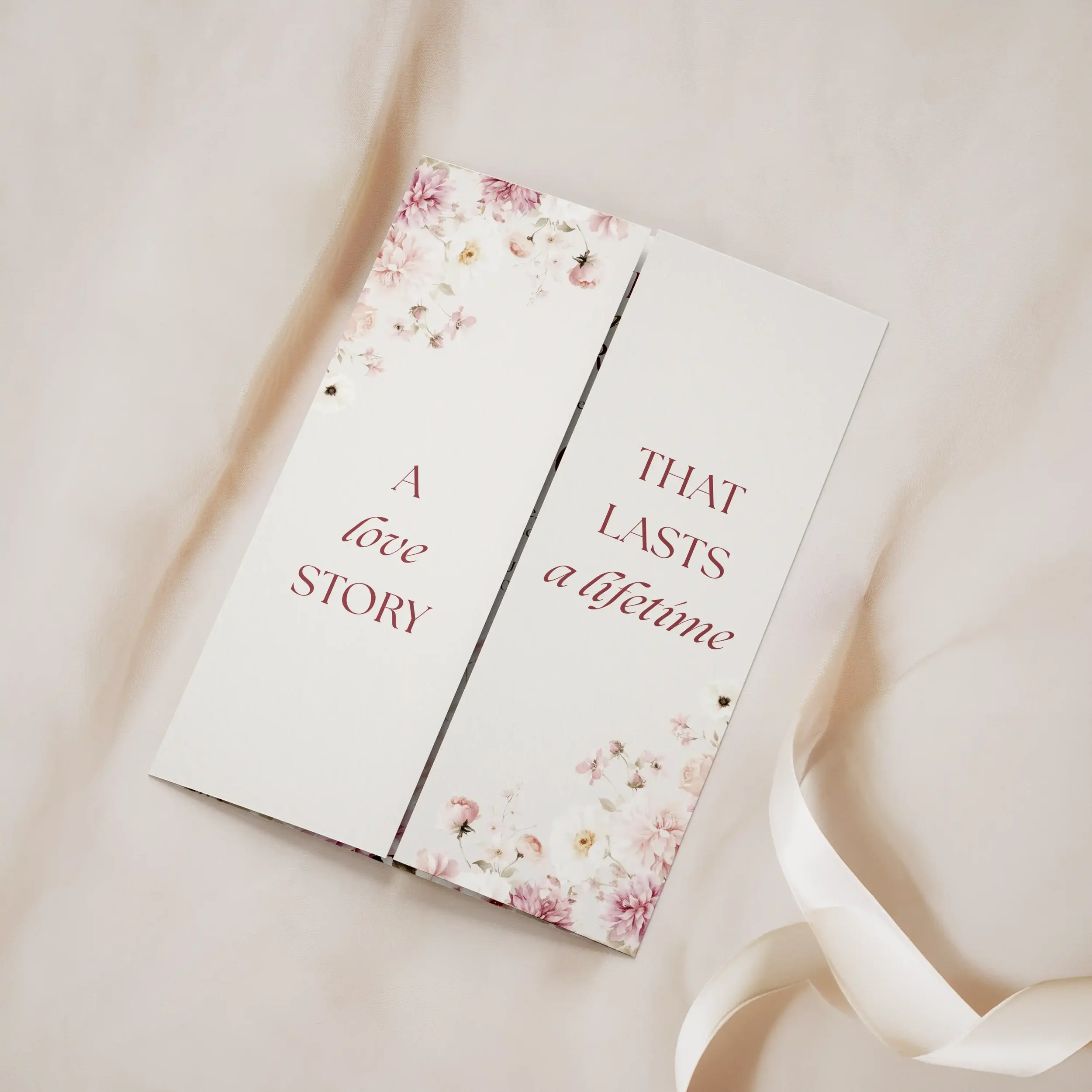 Folded view of the Petal Gatefold Wedding Invitation with custom details panel and order of the day timeline.