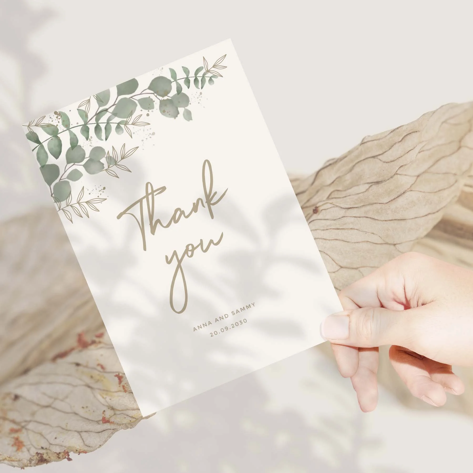 Hand holding a Modern Eucalyptus wedding thank you card