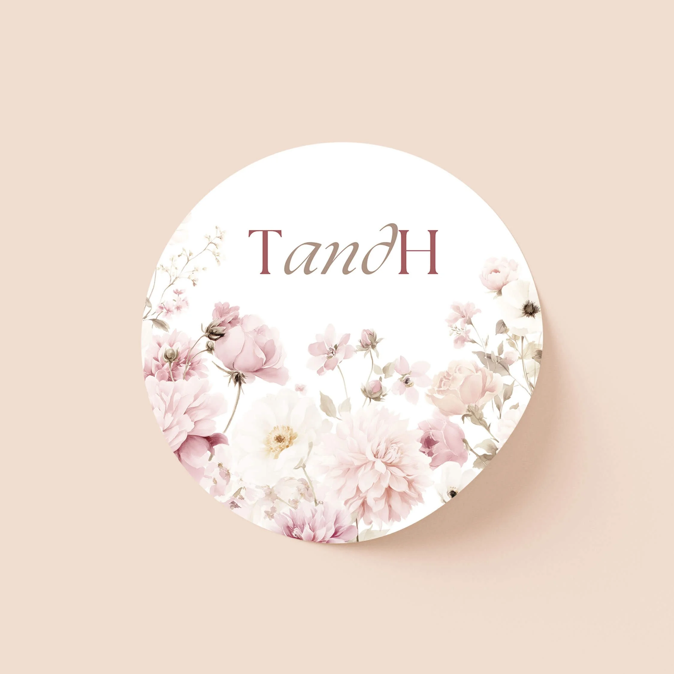 Petal personalised wedding sticker with blush pink floral design and personalised initials on round sticker