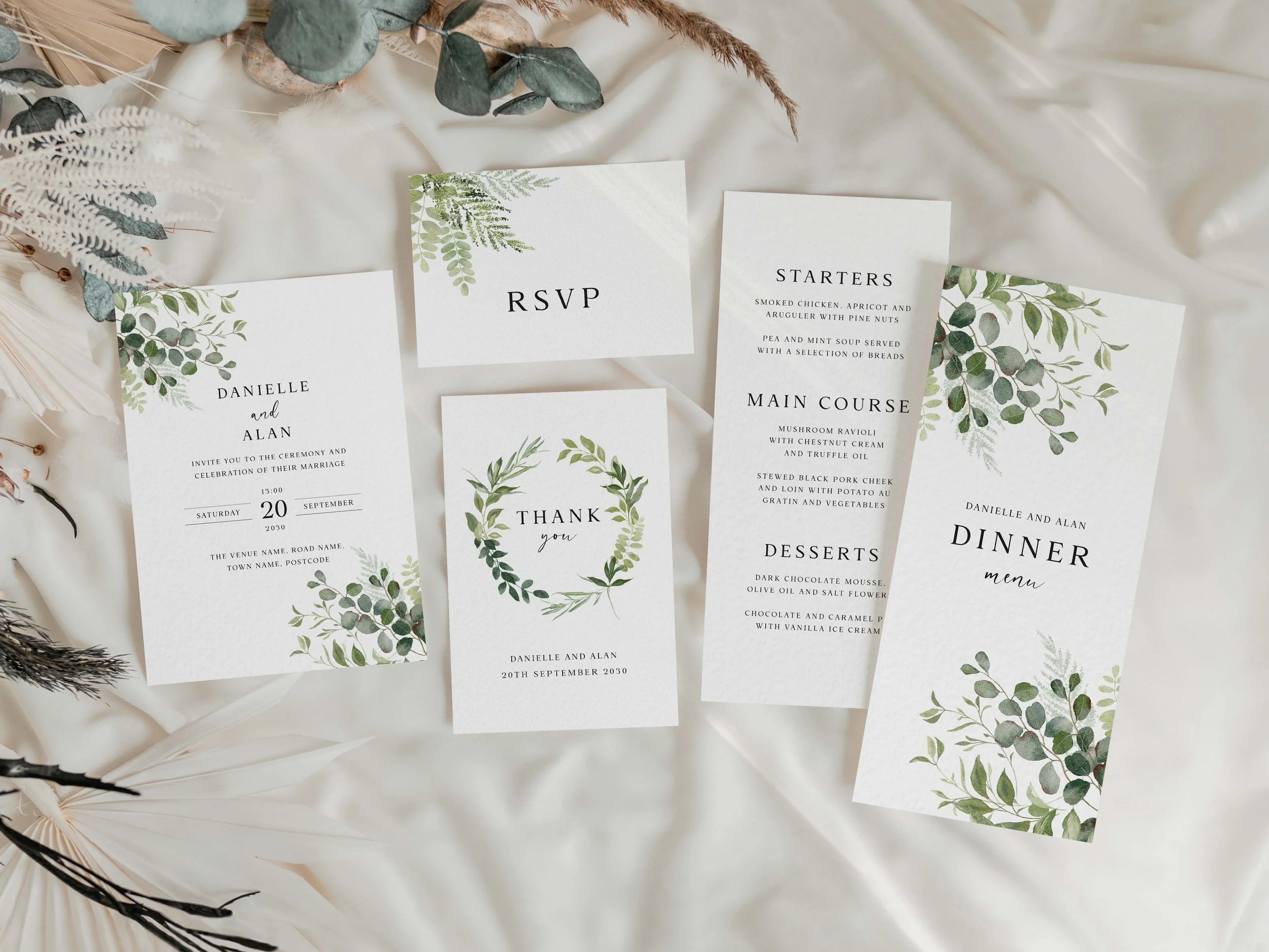 Complete wedding stationery suite flat lay showing coordinated items from save the date to thank you card