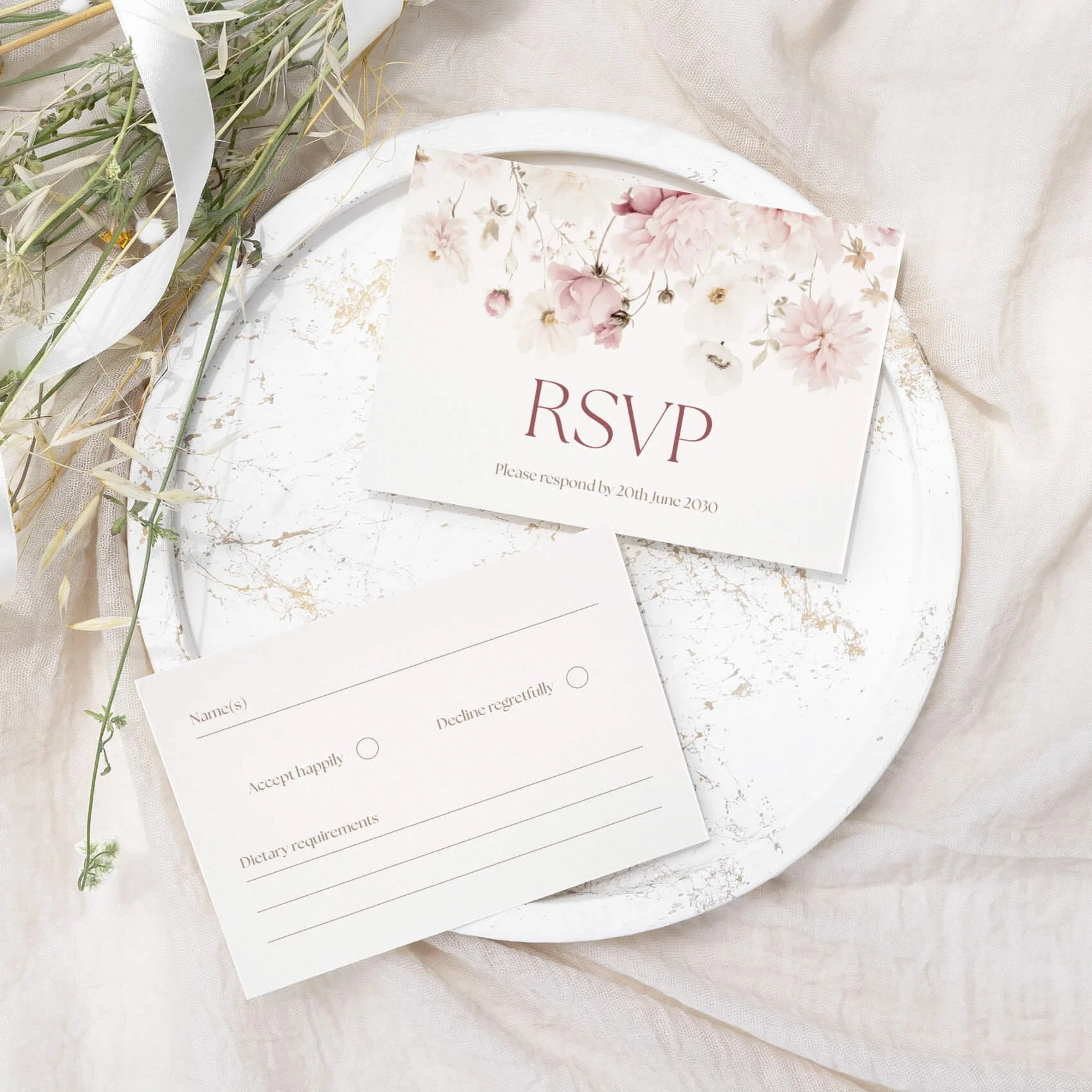 Petal wedding RSVP card with soft blush and pink watercolour floral illustration on luxury off-white card