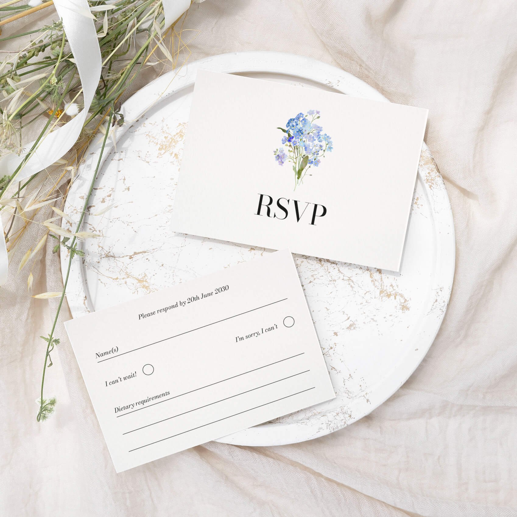 Forget Me Not wedding RSVP card with blue watercolour floral illustration on luxury off-white card