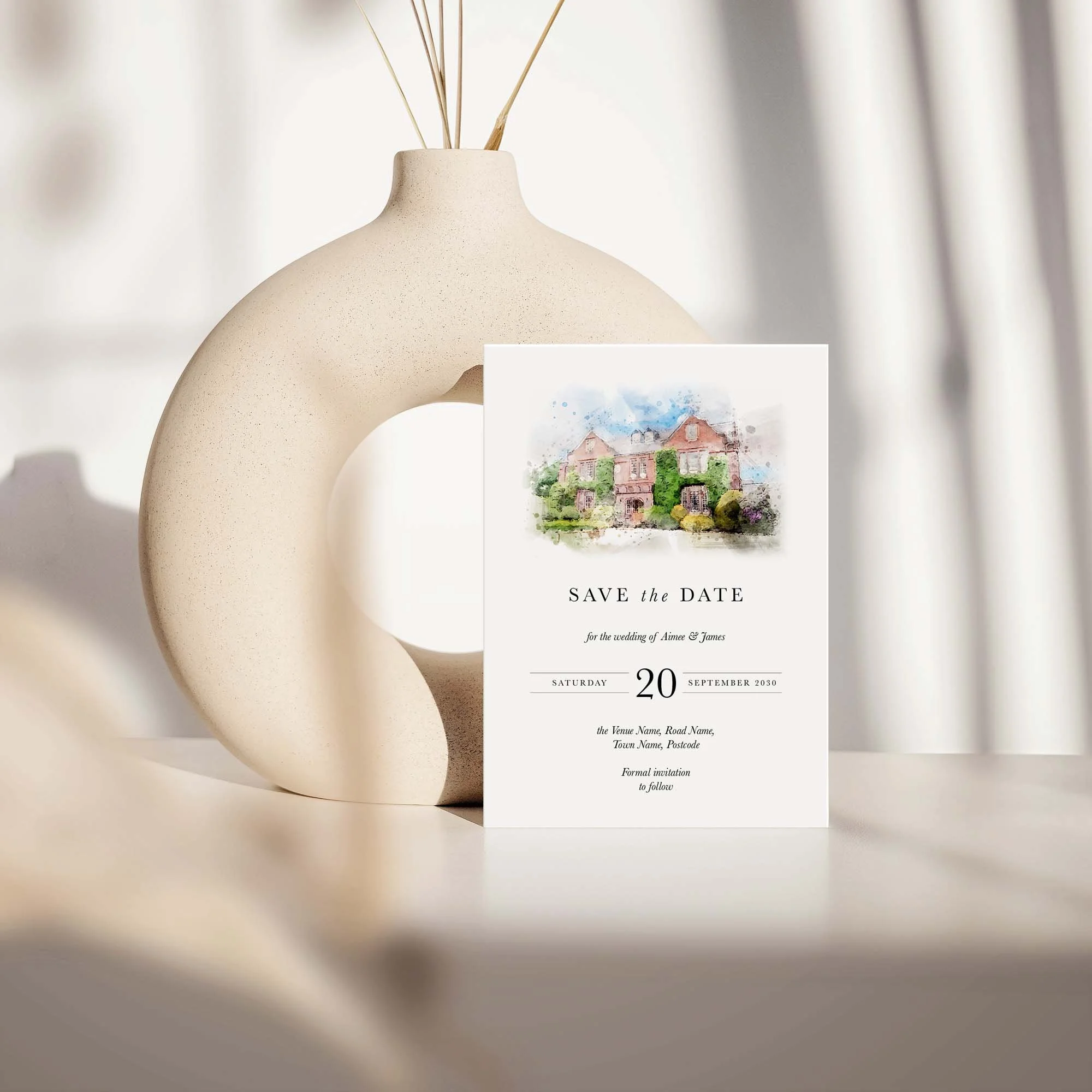 Wedding save the date card featuring a personalised watercolour wedding venue illustration