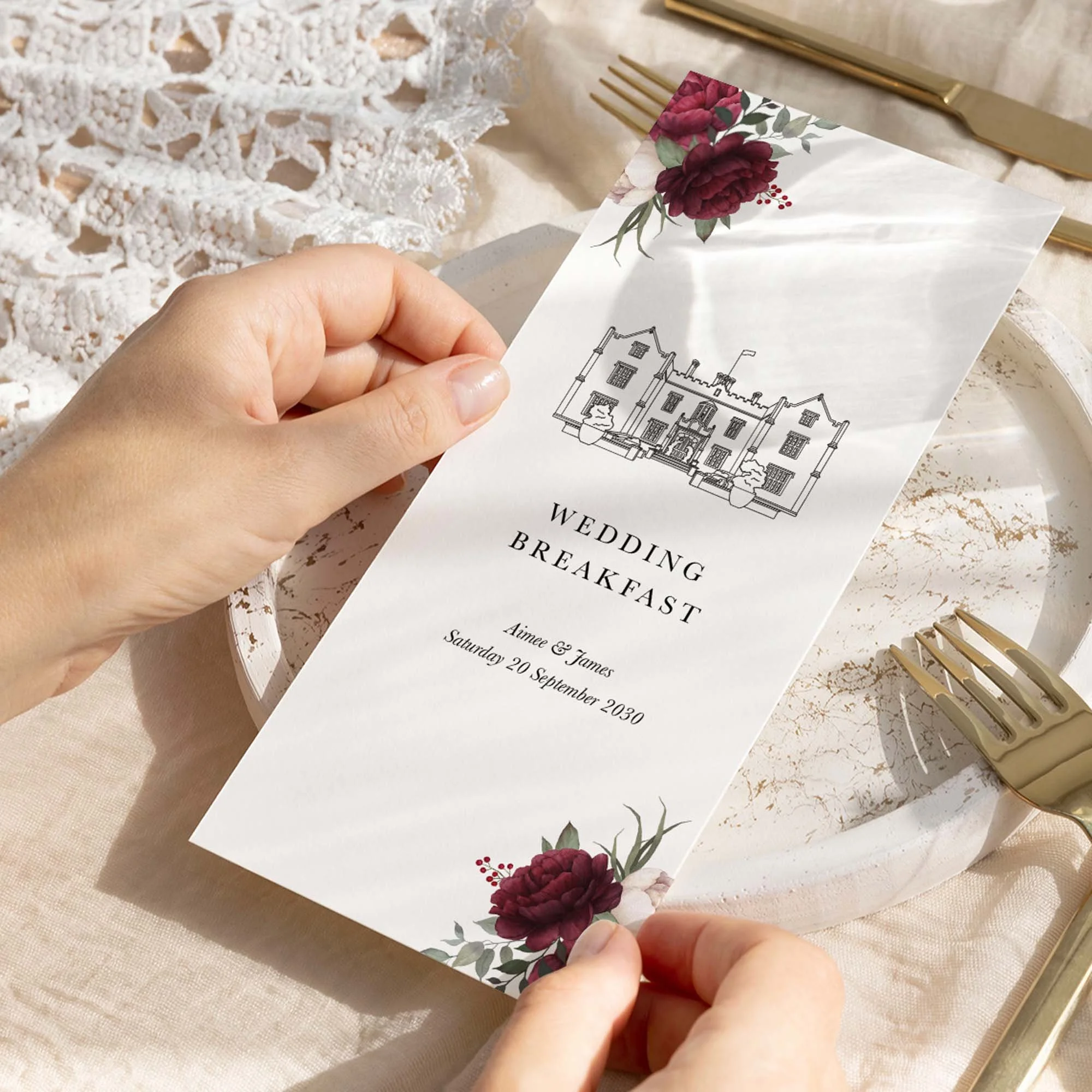 Hand holding Venue Floral wedding menu card showing size and printed design details
