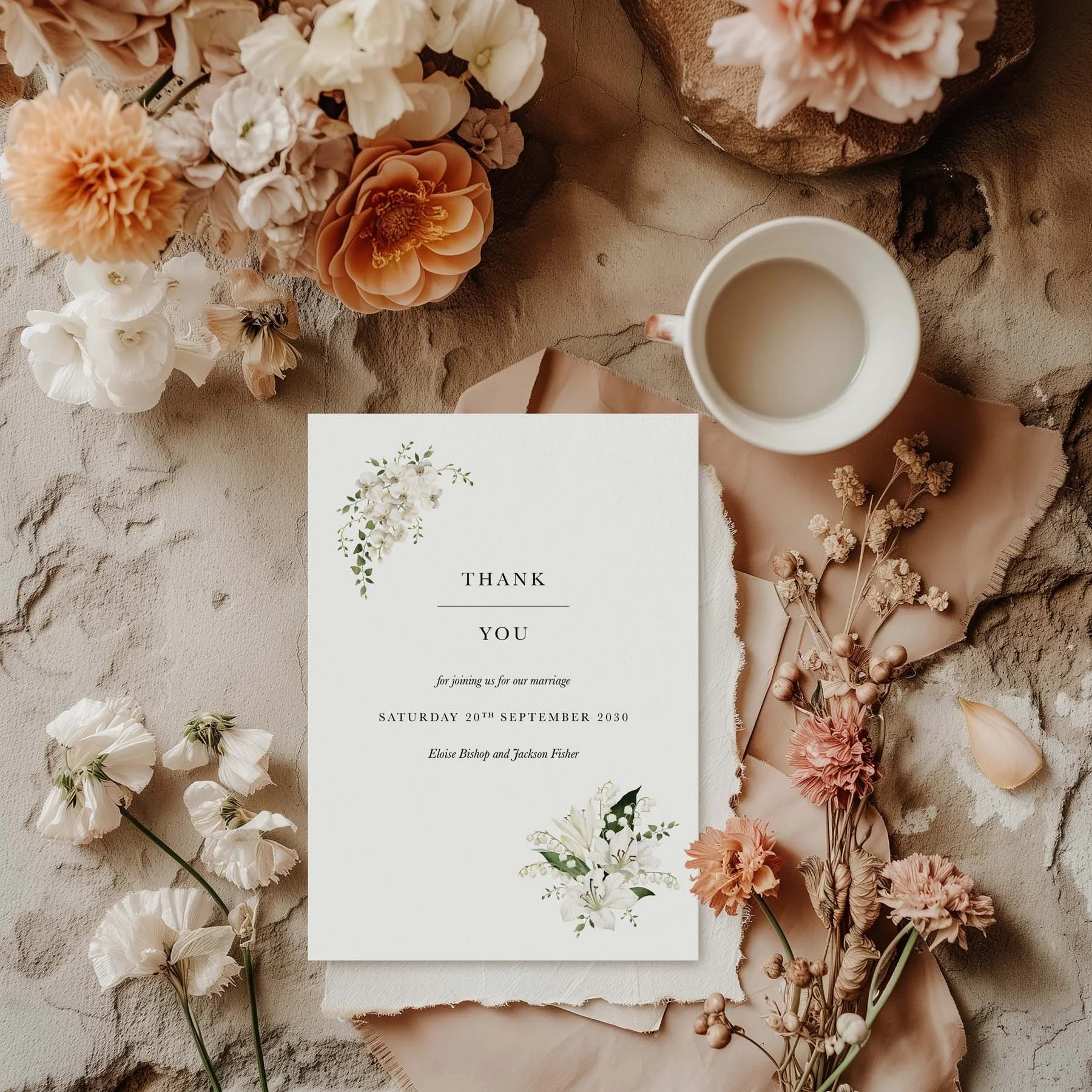 White Lily wedding thank you card styled with flowers and stationery details