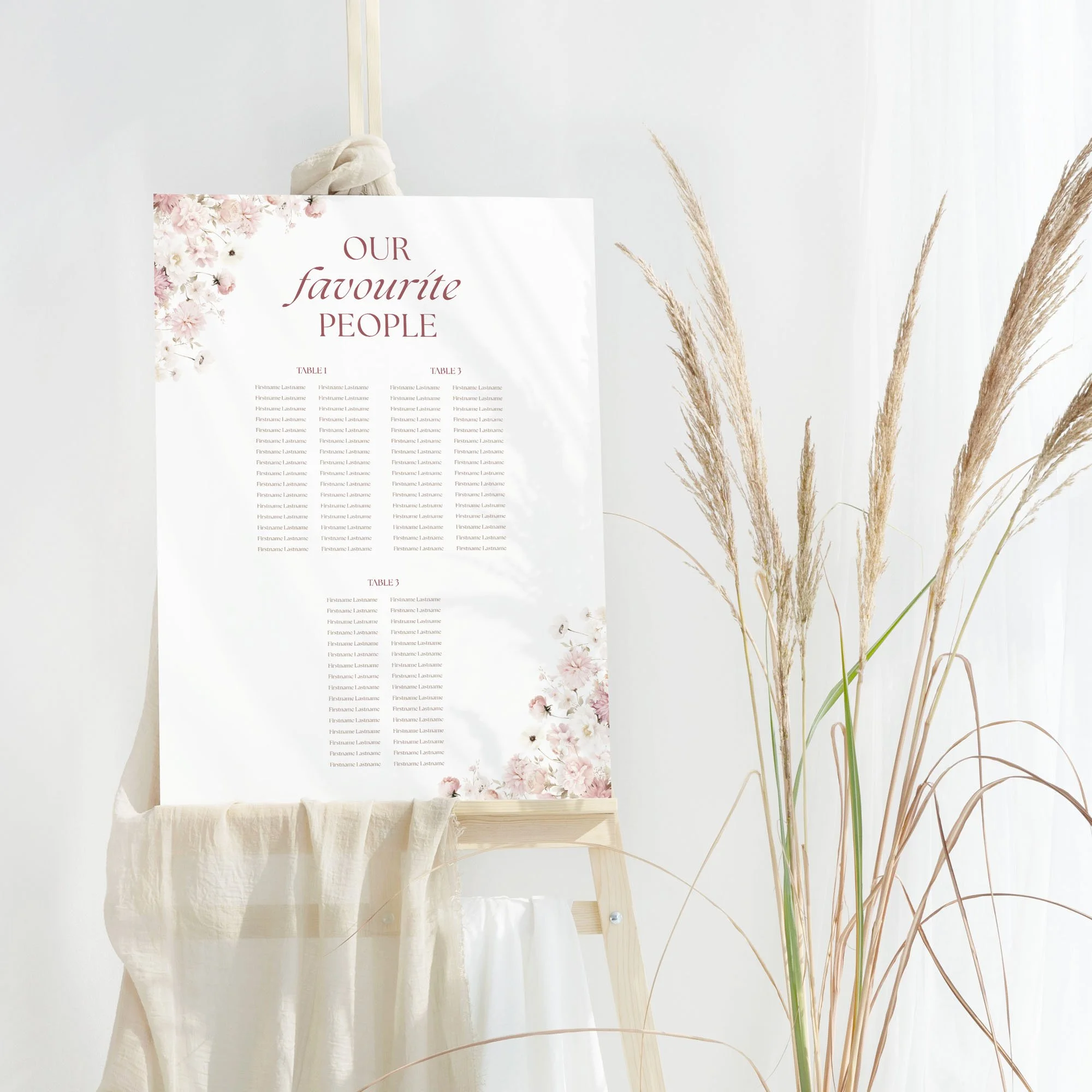 Petal Wedding Table Plan Board showing blush pink floral design around seating details.