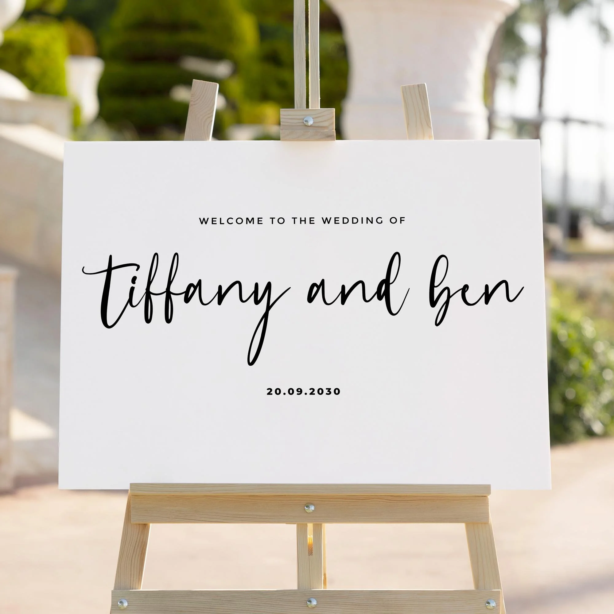 Modern wedding welcome sign styled outdoors close-up