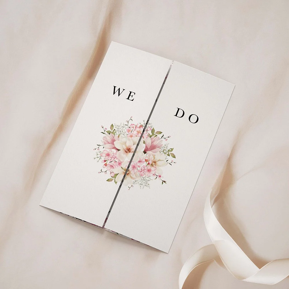 Cherry Blossom Collection gatefold invitation closed, with large pink cherry blossom branch and sage green leaves.