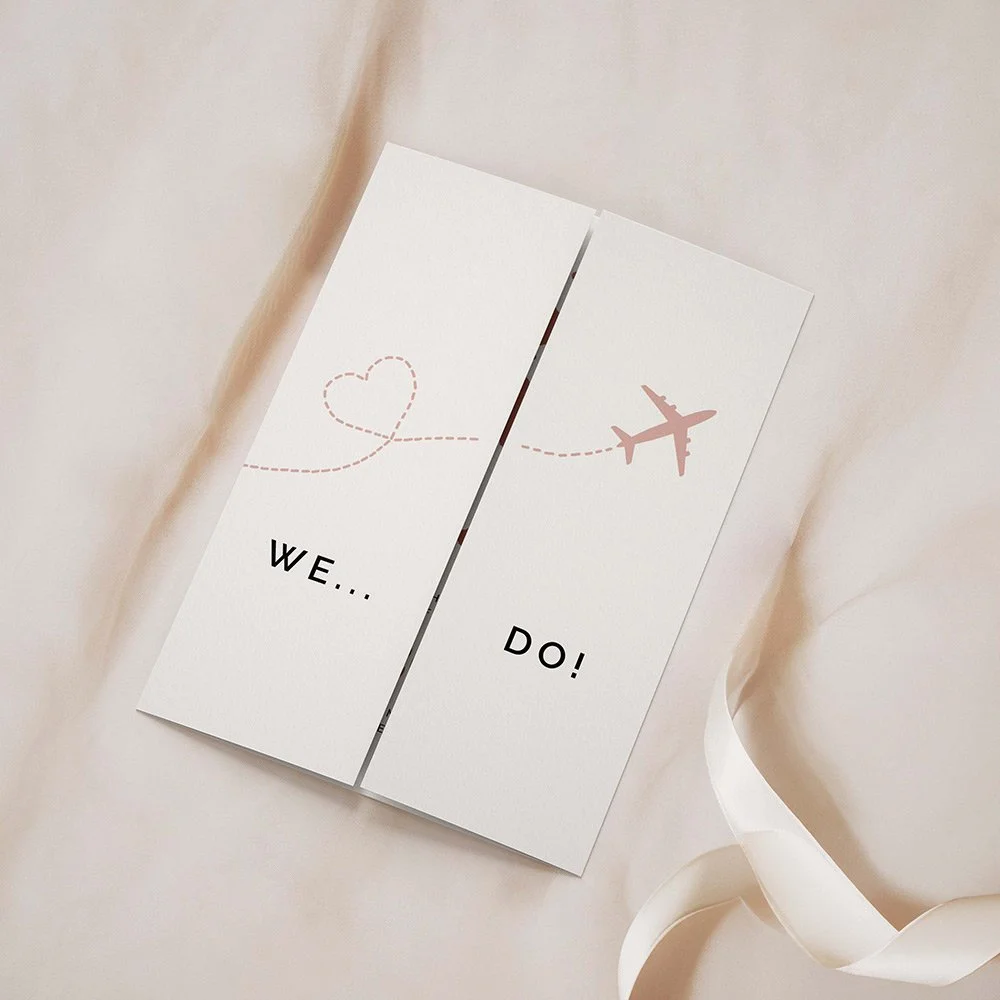 Travel Collection gatefold wedding invitation closed, featuring custom country illustration and soft neutral colour palette with elegant typography.