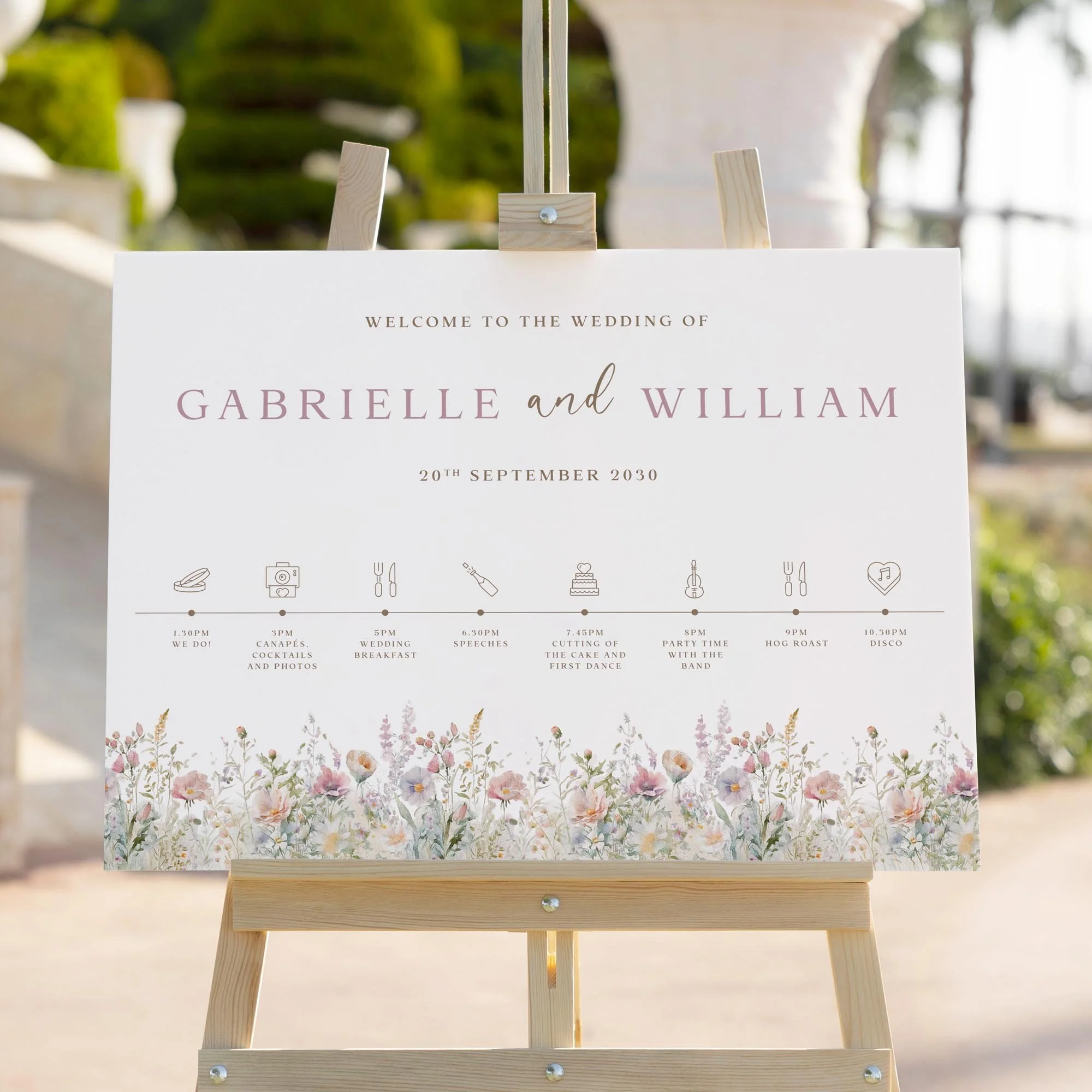Dusty Pink Field Flowers wedding welcome sign styled outdoors close-up