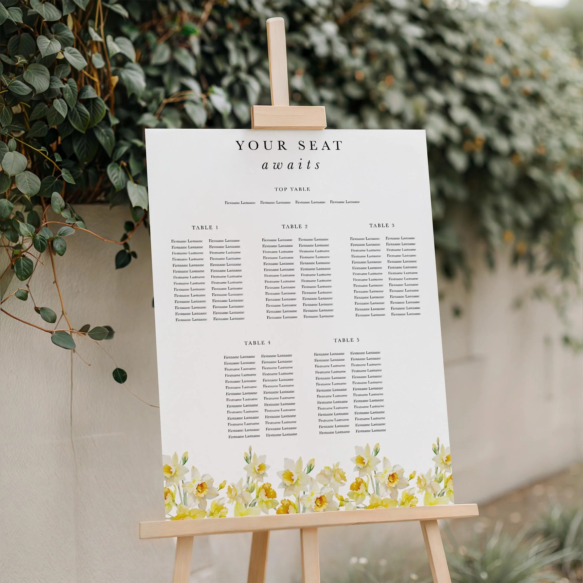Close-up of the Daffodil wedding seating plan board displayed outdoors