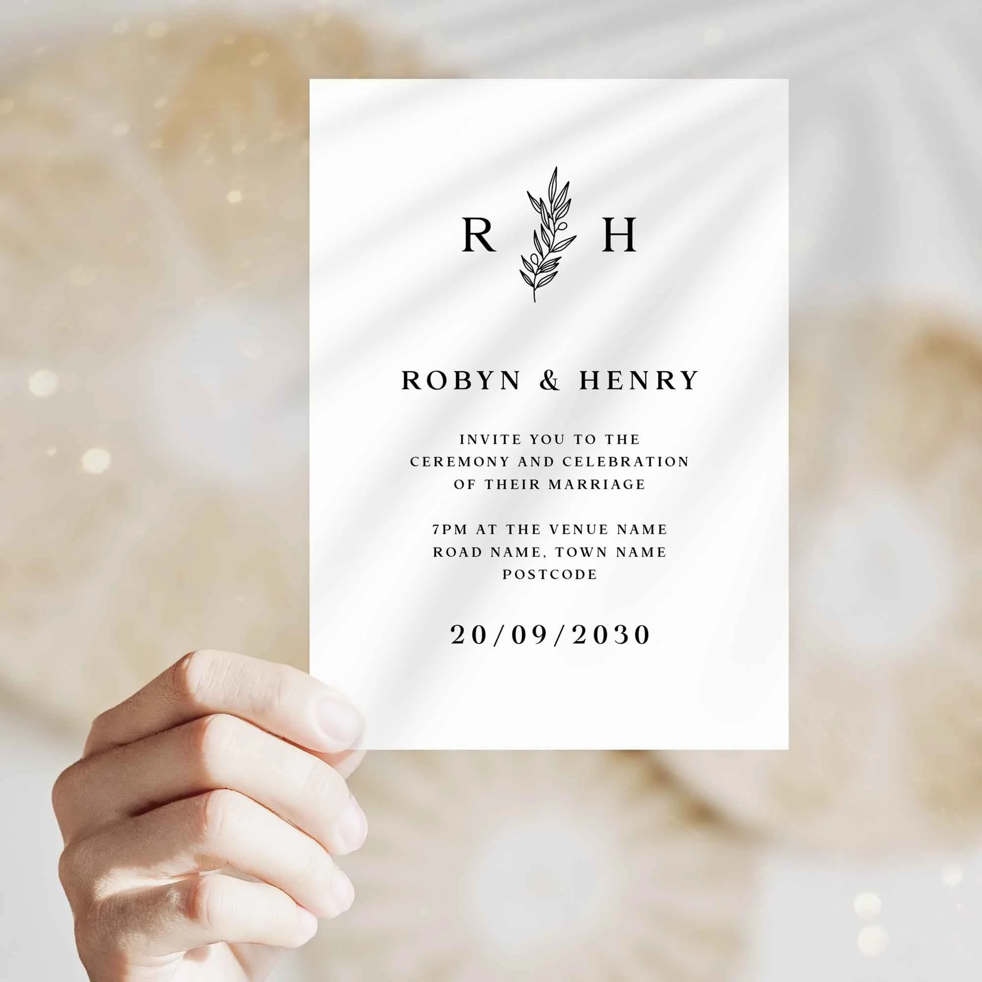 Hand holding Heritage wedding invitation showing size and printed design details