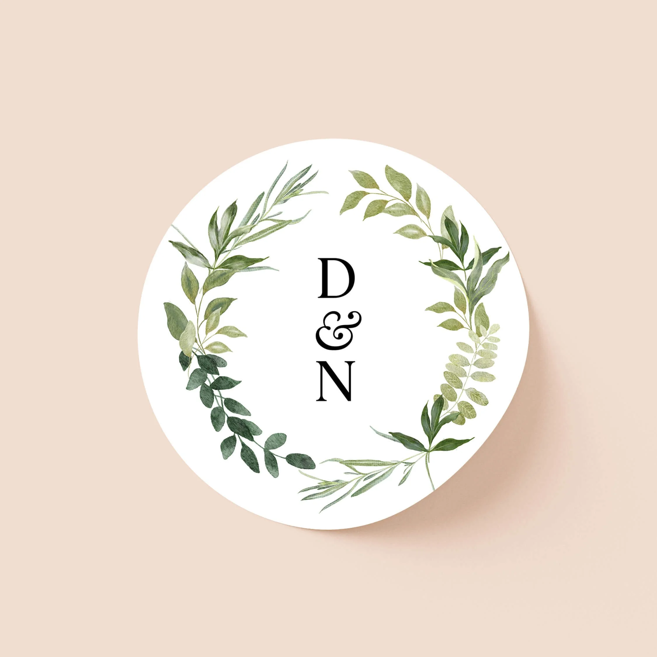 Greenery personalised wedding sticker with botanical foliage wreath and elegant initials on round sticker