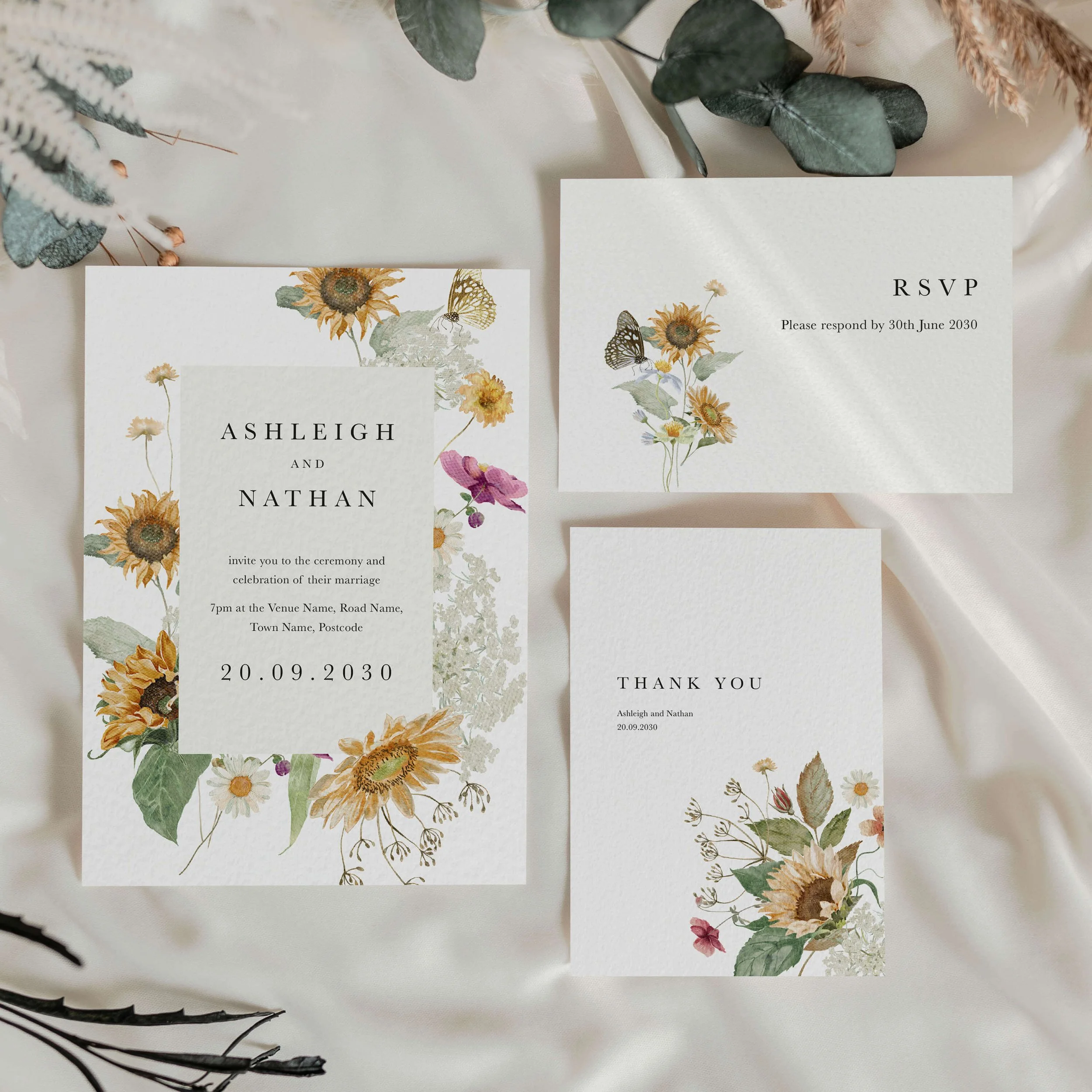 The Autumn Sunflower wedding stationery collection featuring invitation and RSVP card with a sunflower and mixed wildflower botanical corner bouquet