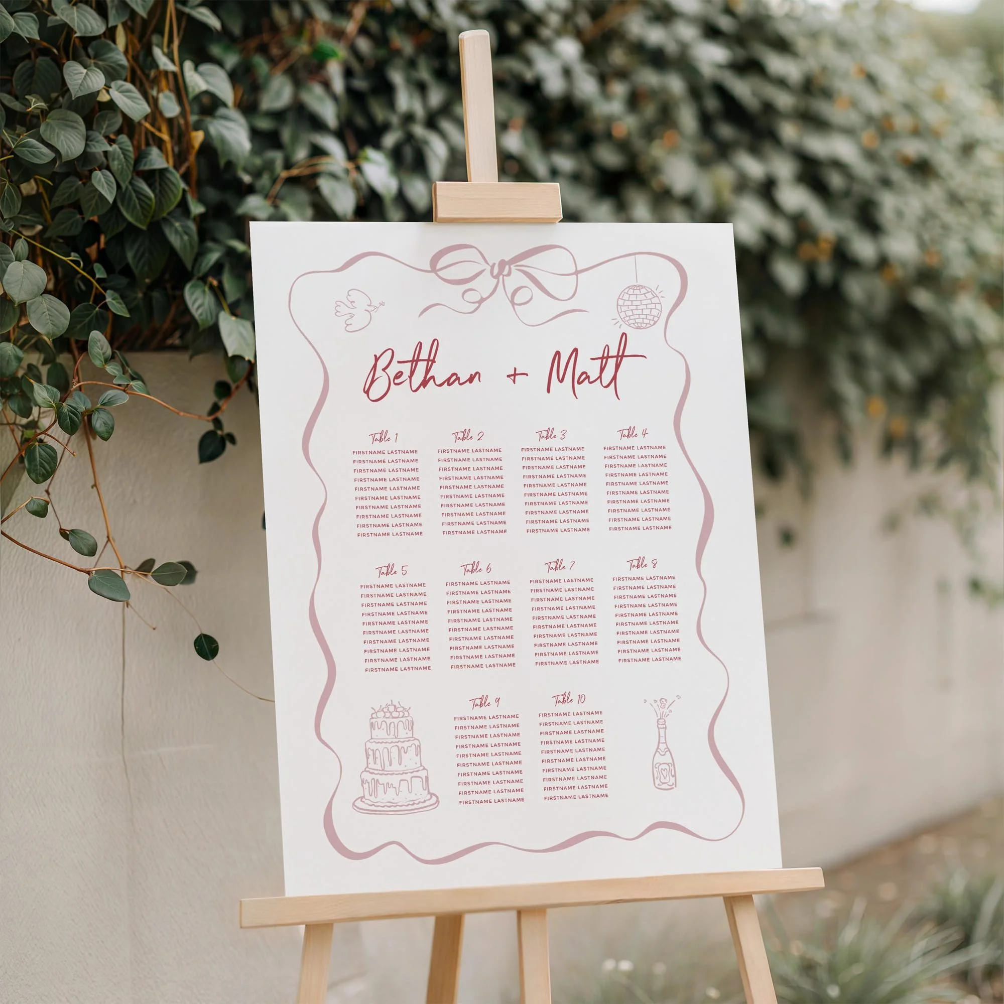 Close-up of the Pink Playful Illustration wedding seating plan board with modern doodle artwork displayed outdoors