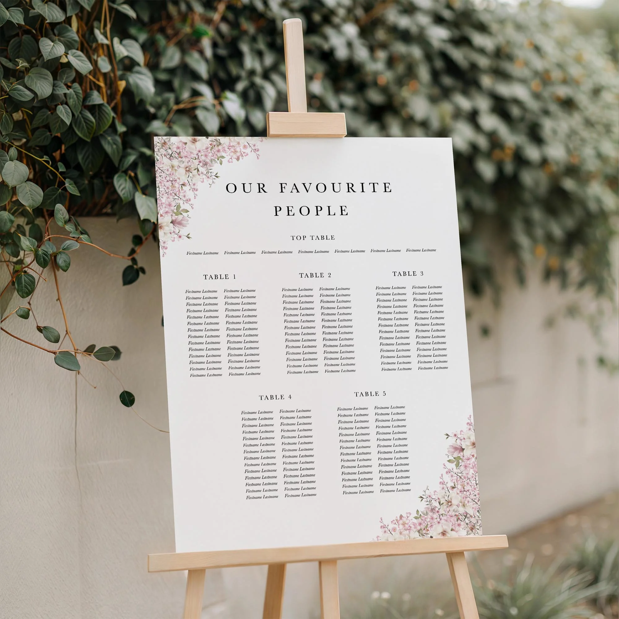 Close-up of the Cherry Blossom wedding seating plan board displayed outdoors