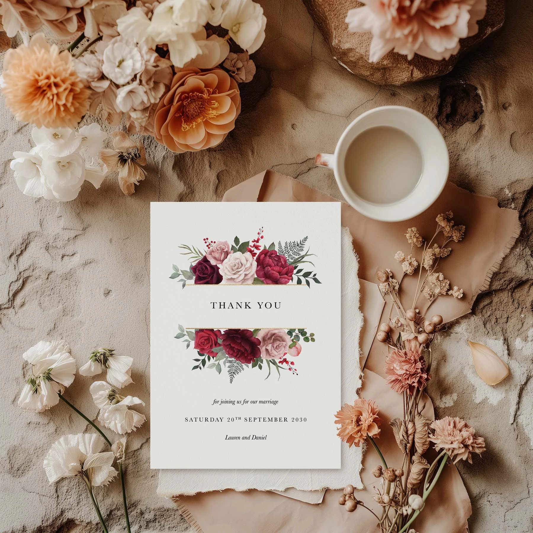 Burgundy Floral wedding thank you card styled with flowers and stationery details