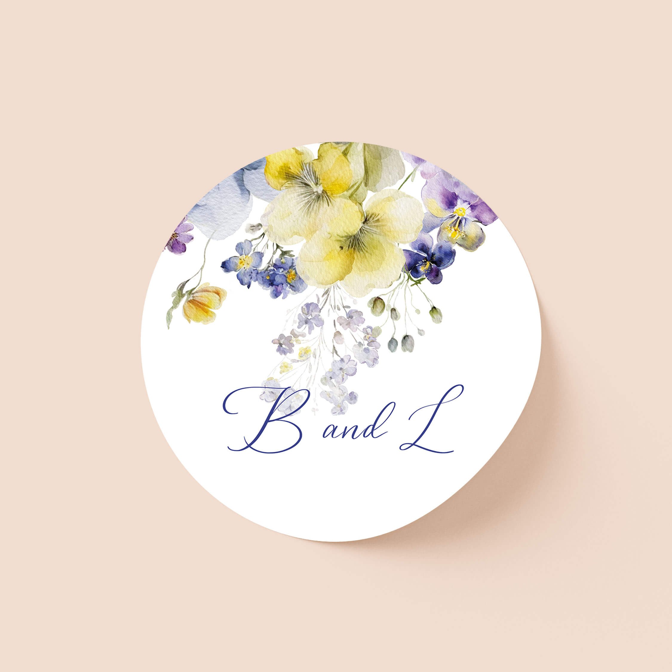 Violet personalised wedding sticker with purple violet and yellow pansy illustration and script names on round sticker