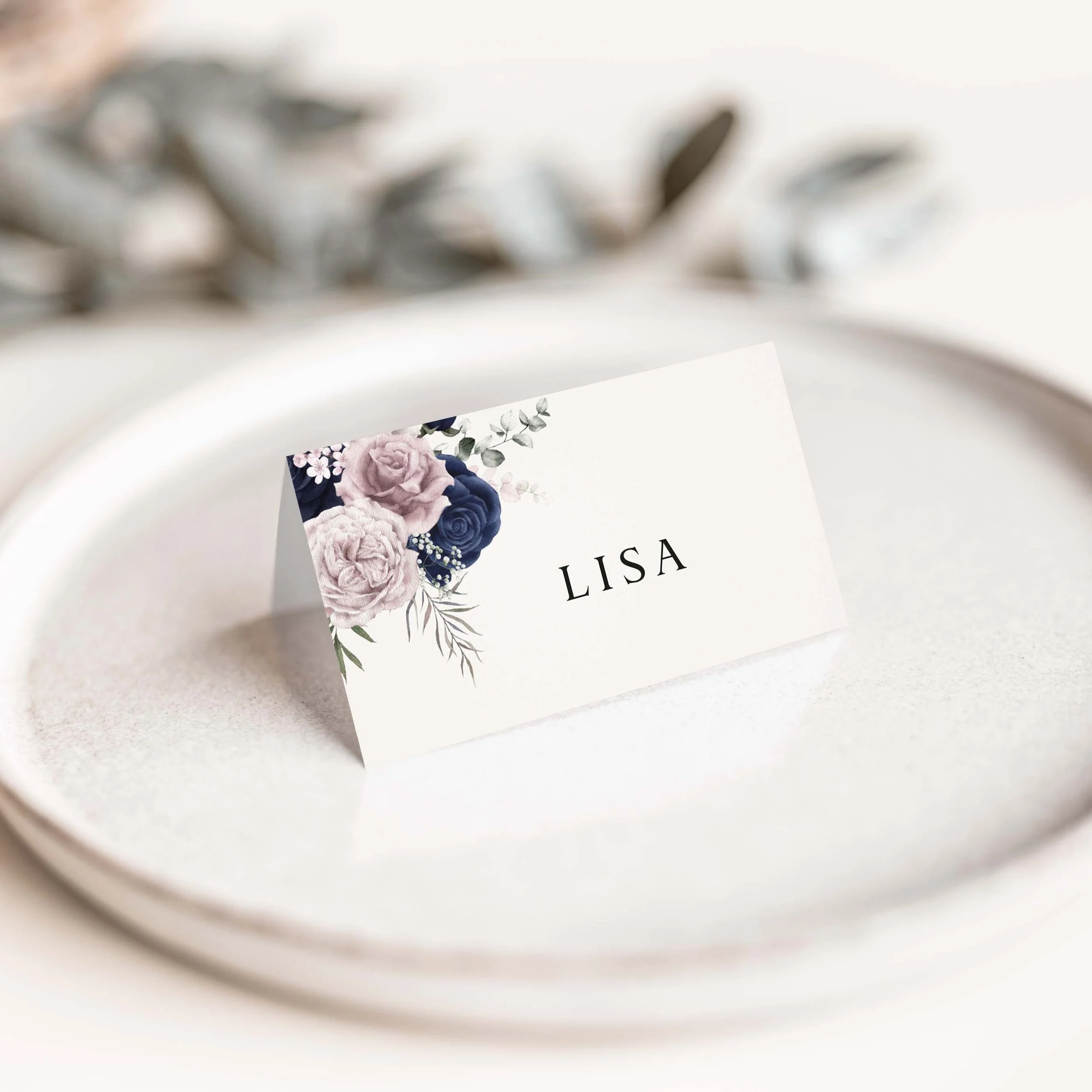 Navy and blush floral wedding place card with corner flower detail