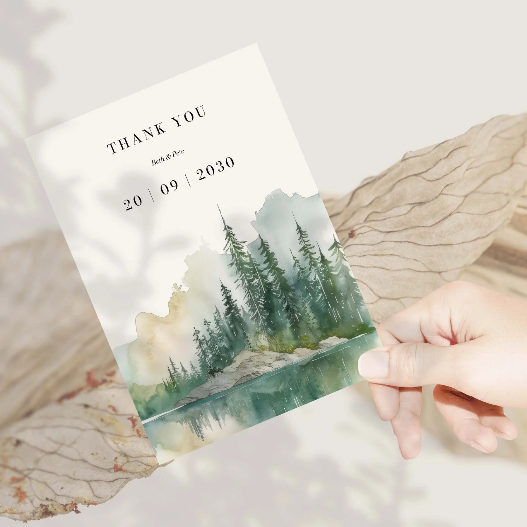 Hand holding a Green Trees and Mountains wedding thank you card